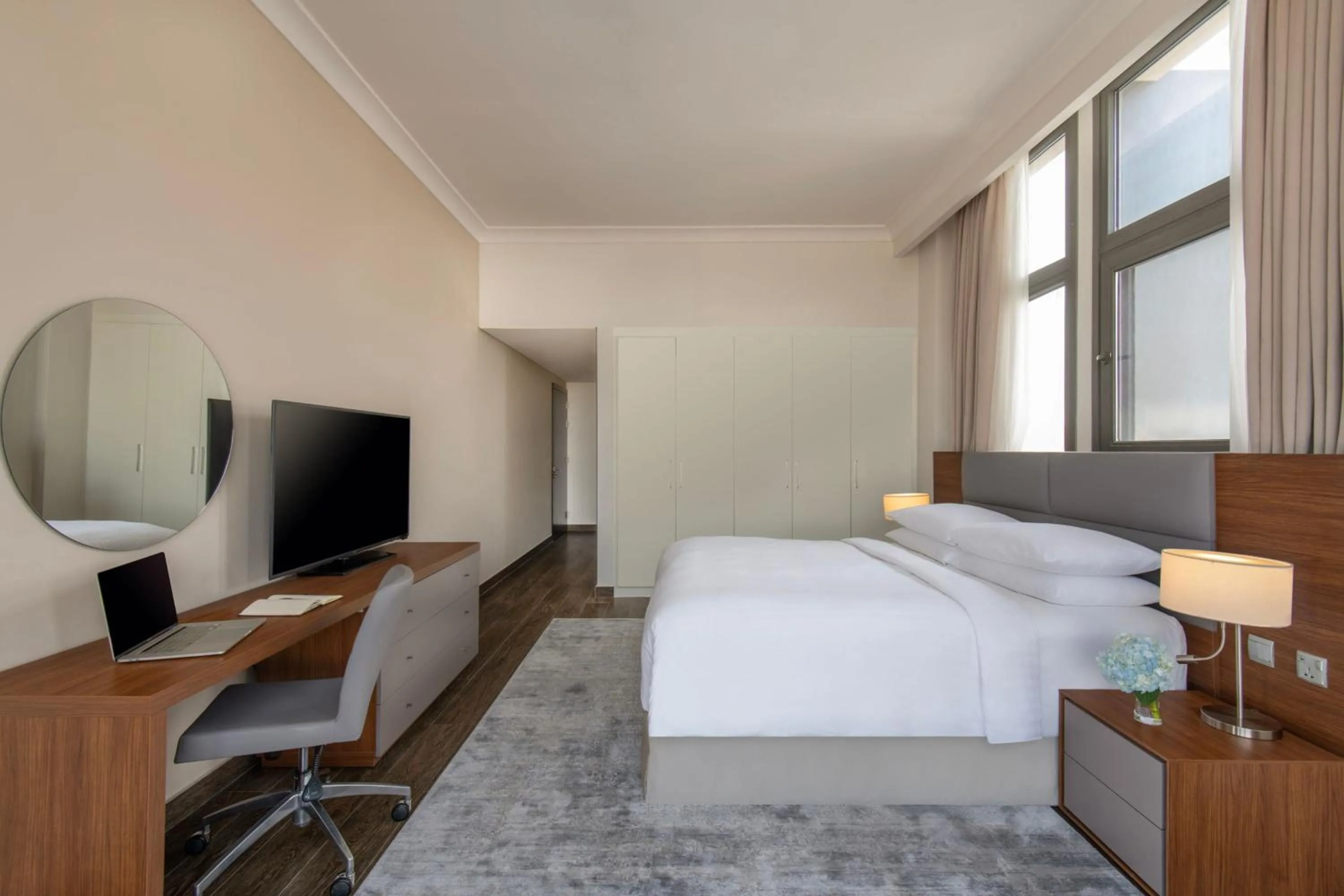 Photo of the whole room, Bed in Marriott Executive Apartments Doha, Le Mirage City Walk