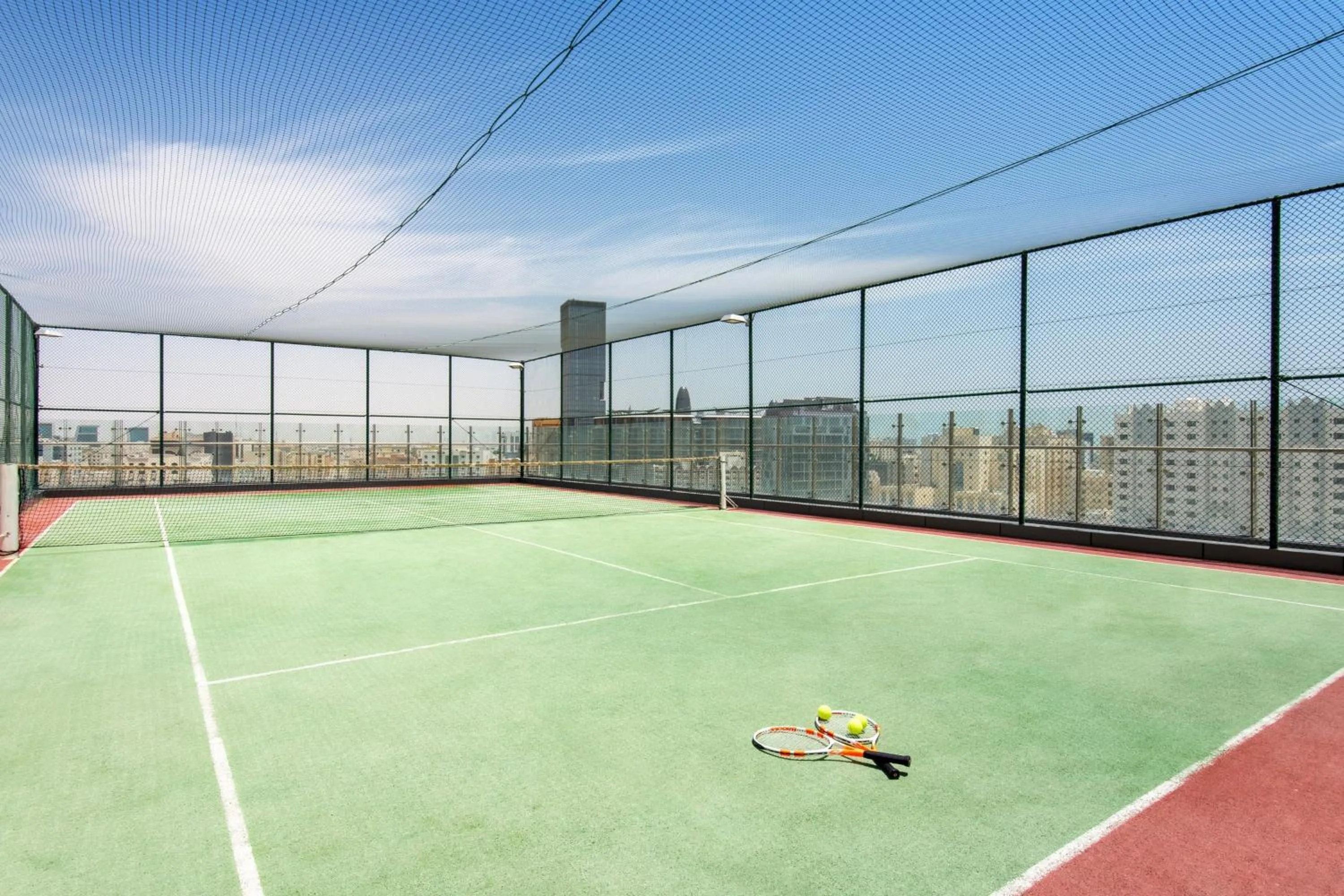 Tennis court in Marriott Executive Apartments Doha, Le Mirage City Walk
