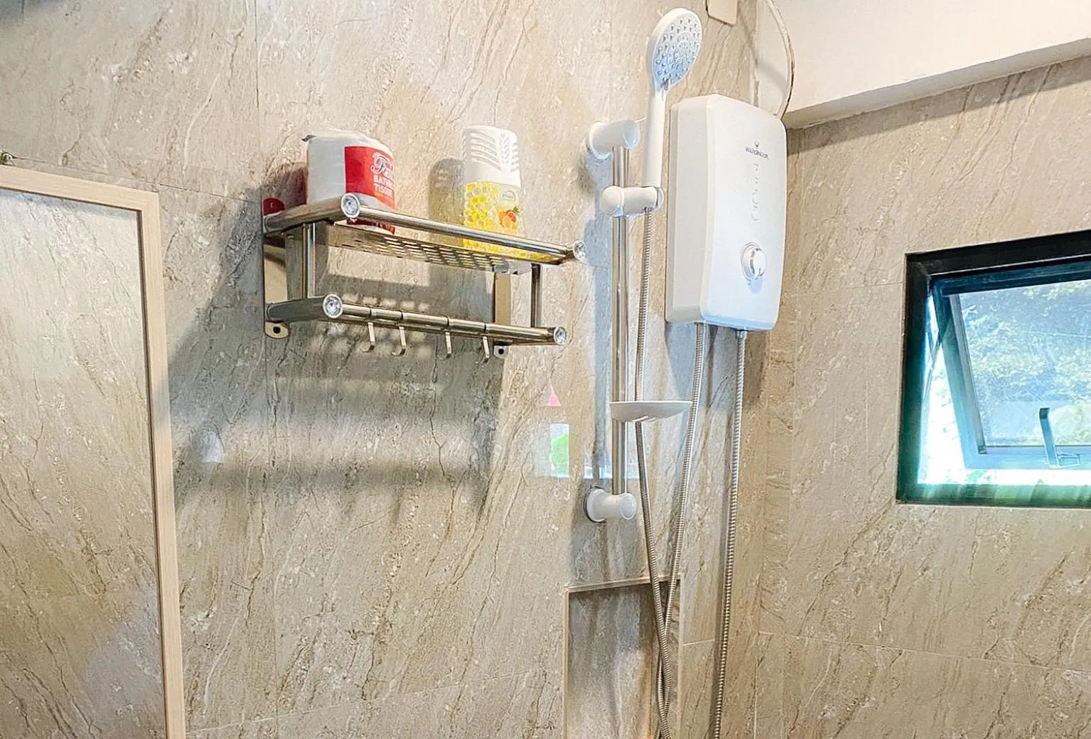 Shower in UrbanView at Balzain East Tuguegarao City by RedDoorz