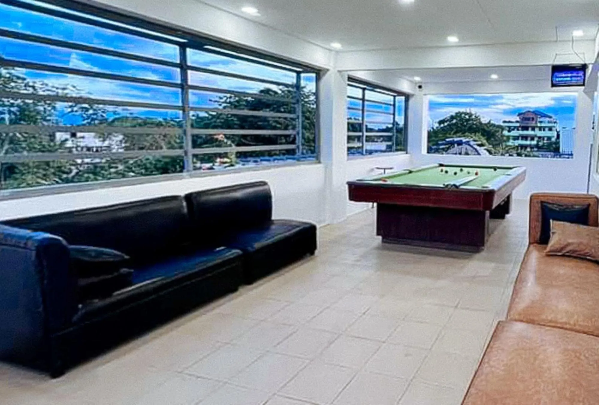 Seating area in UrbanView at Balzain East Tuguegarao City by RedDoorz