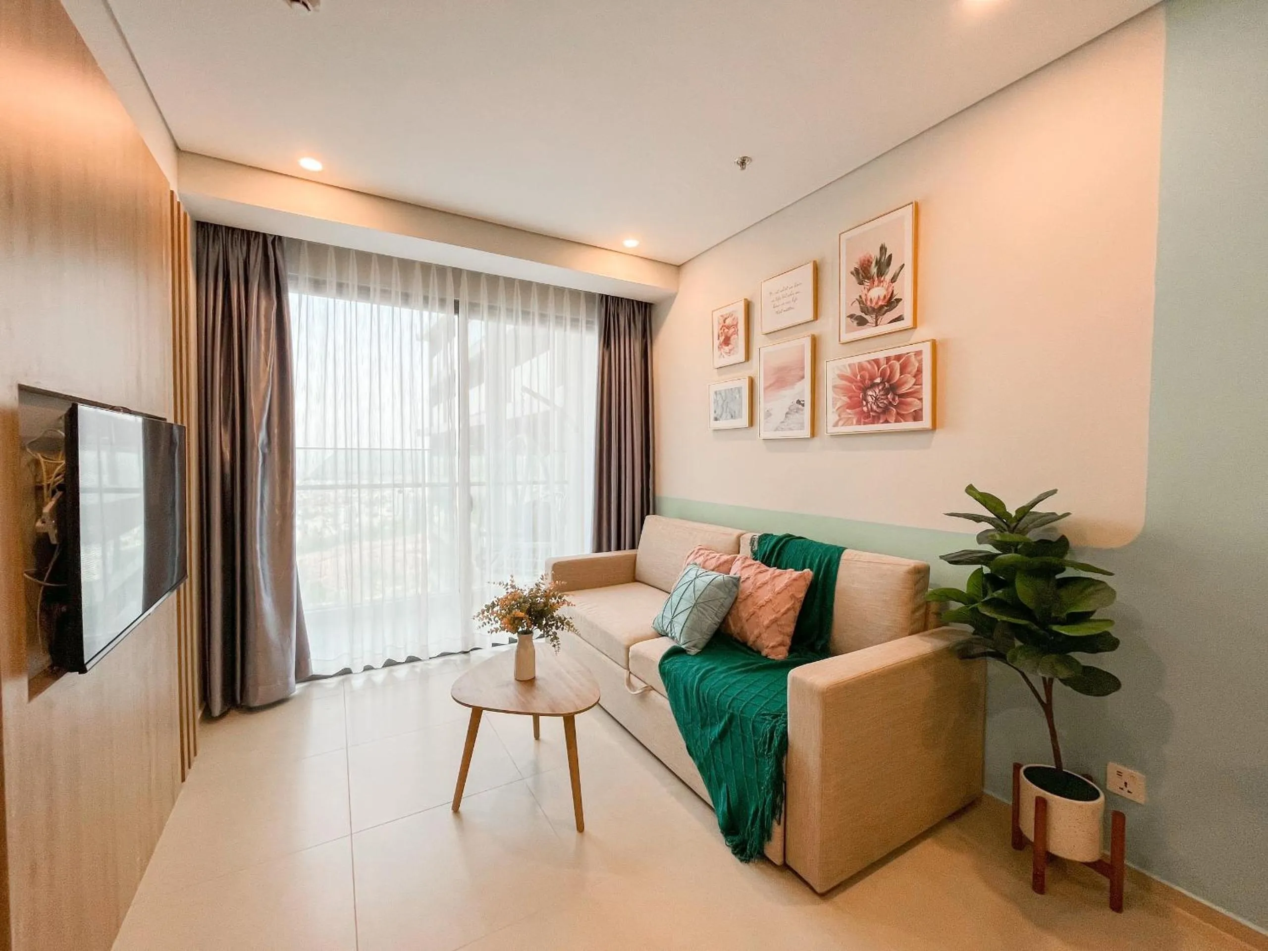 Communal lounge/ TV room in The Sóng Apartment Vũng Tàu - Mita House