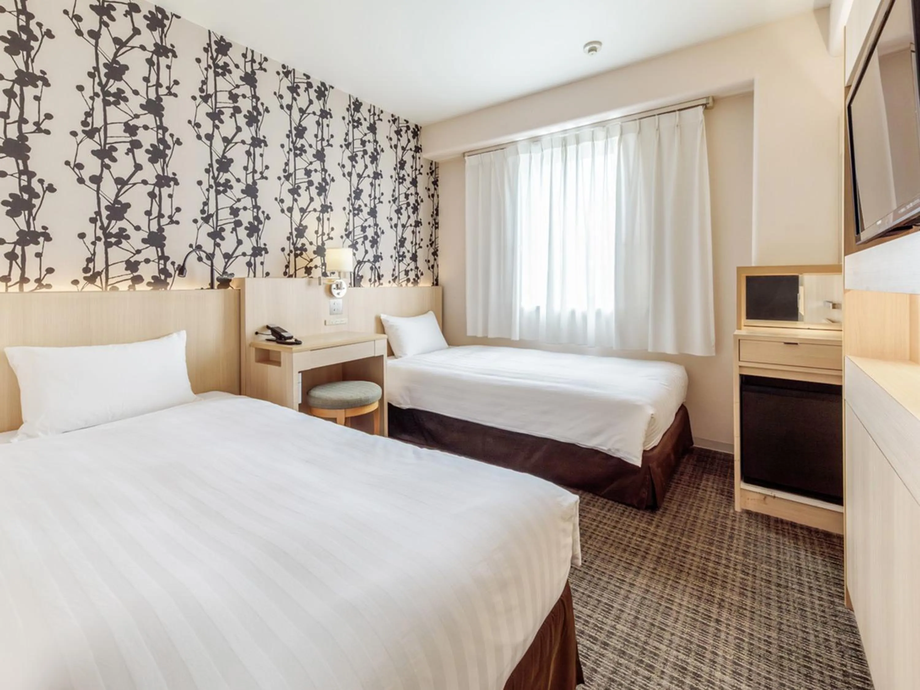 Photo of the whole room, Bed in Nishitetsu Resort Inn Beppu