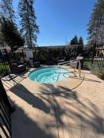 Toilet in Ponderosa Gardens Motel