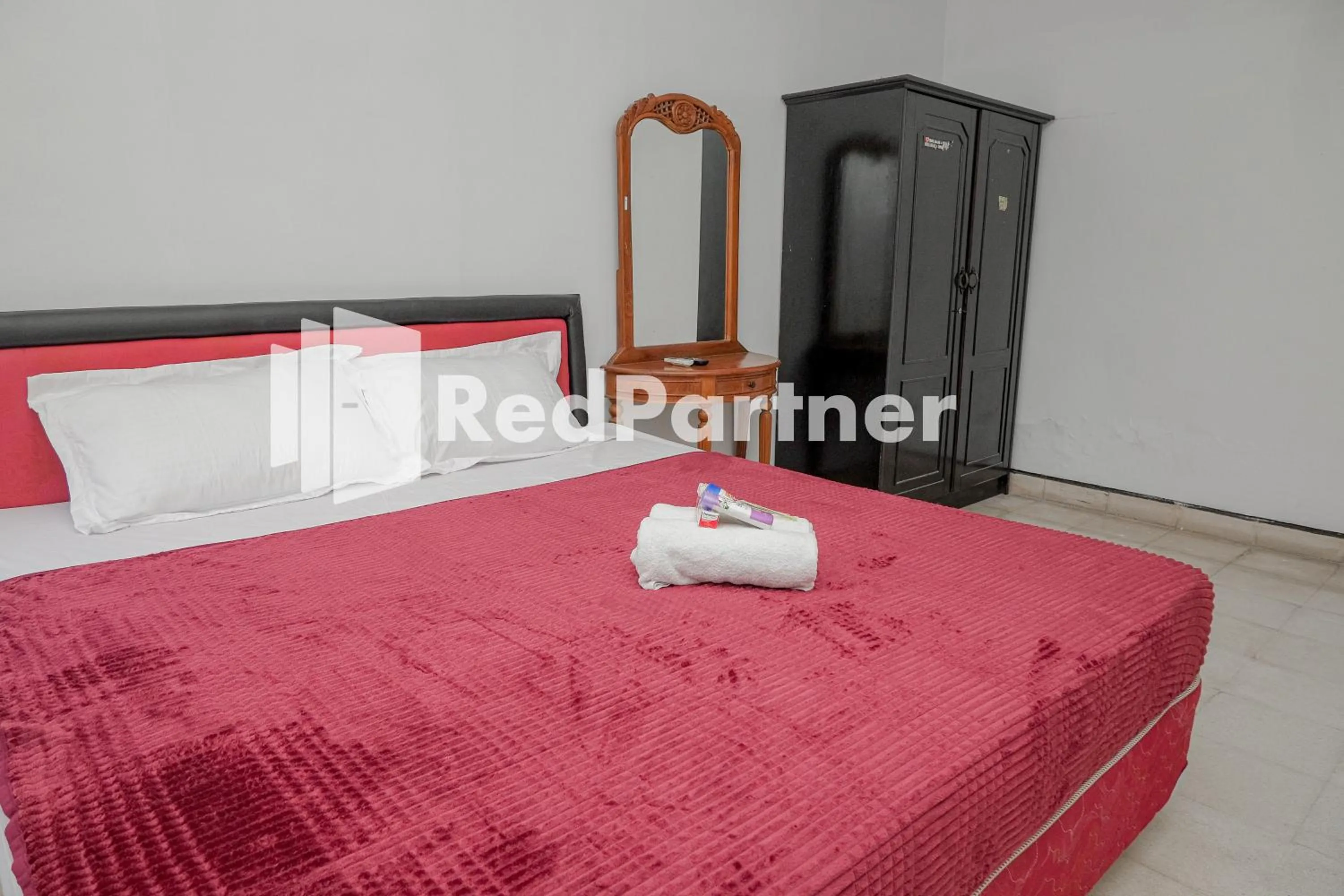 Bedroom in Rajawali Guest House Mitra RedDoorz