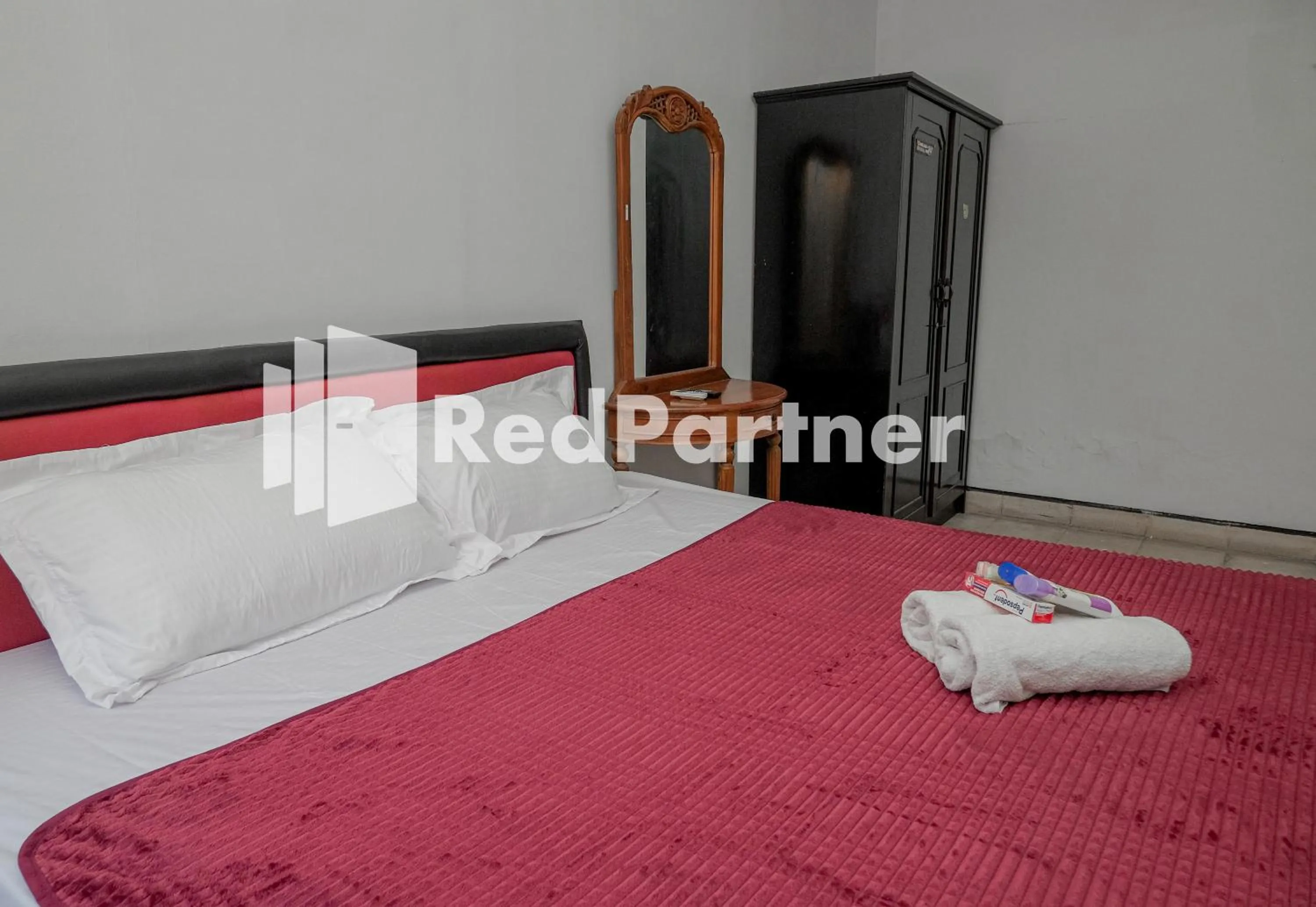 Bedroom in Rajawali Guest House Mitra RedDoorz