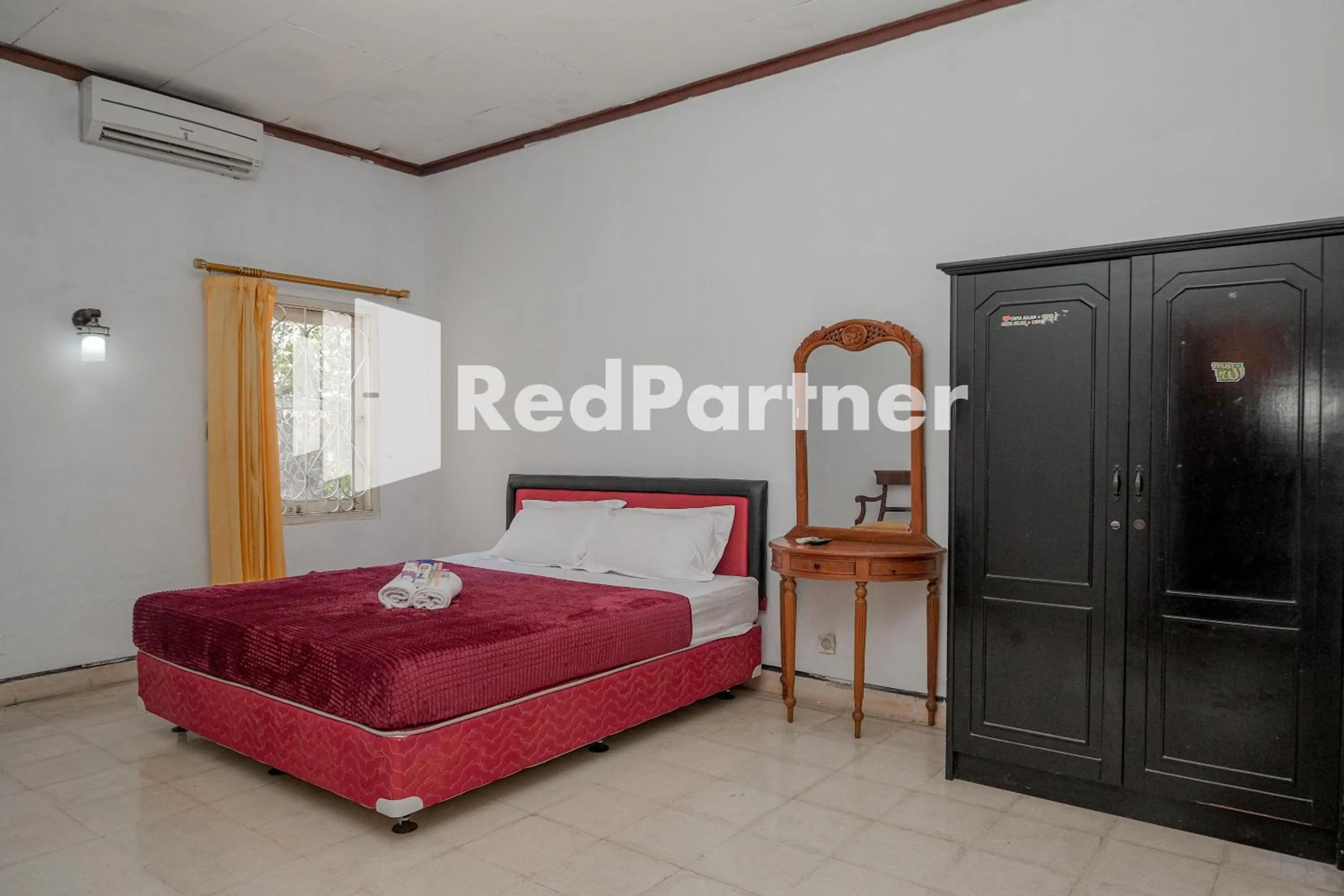Bedroom in Rajawali Guest House Mitra RedDoorz
