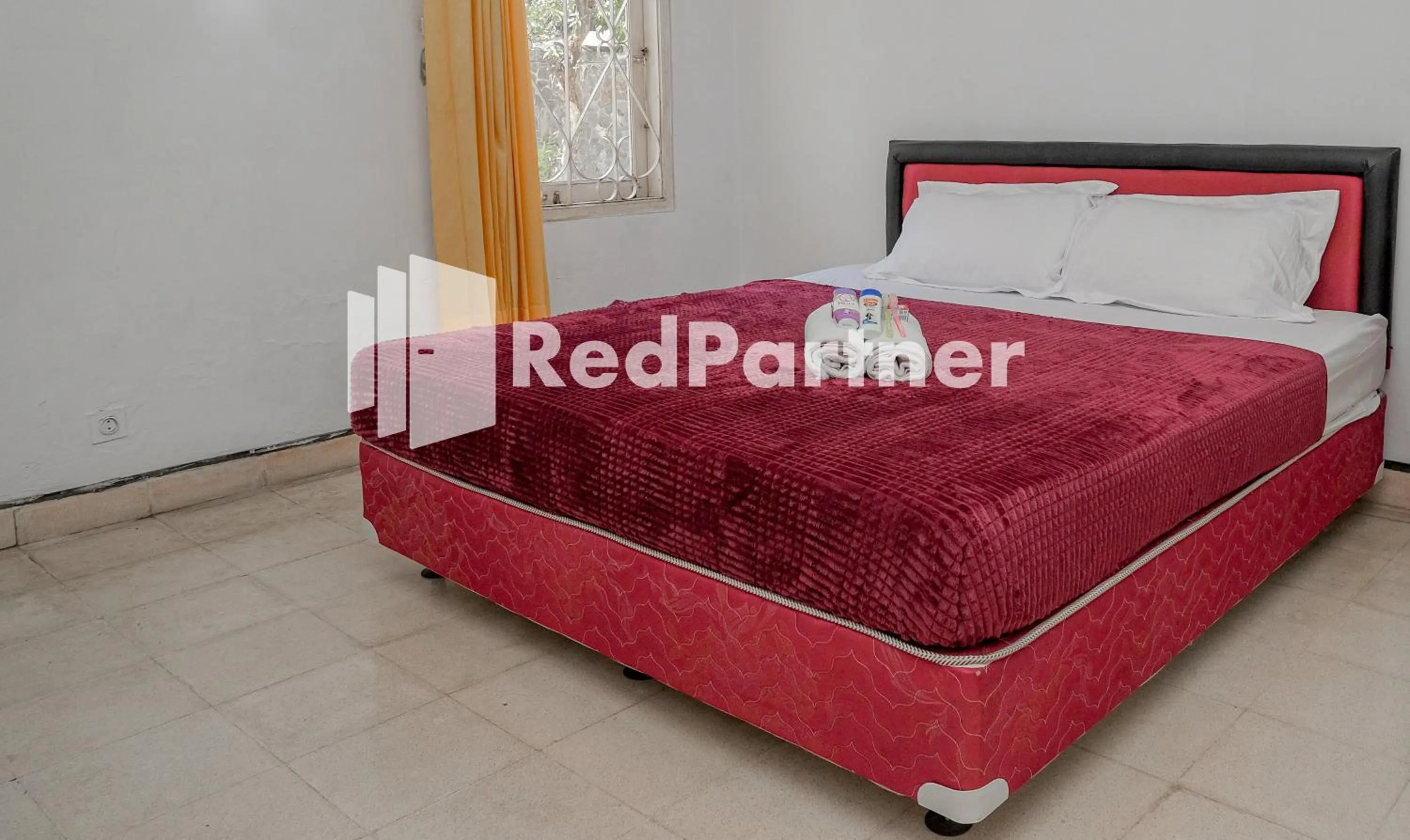 Bedroom in Rajawali Guest House Mitra RedDoorz