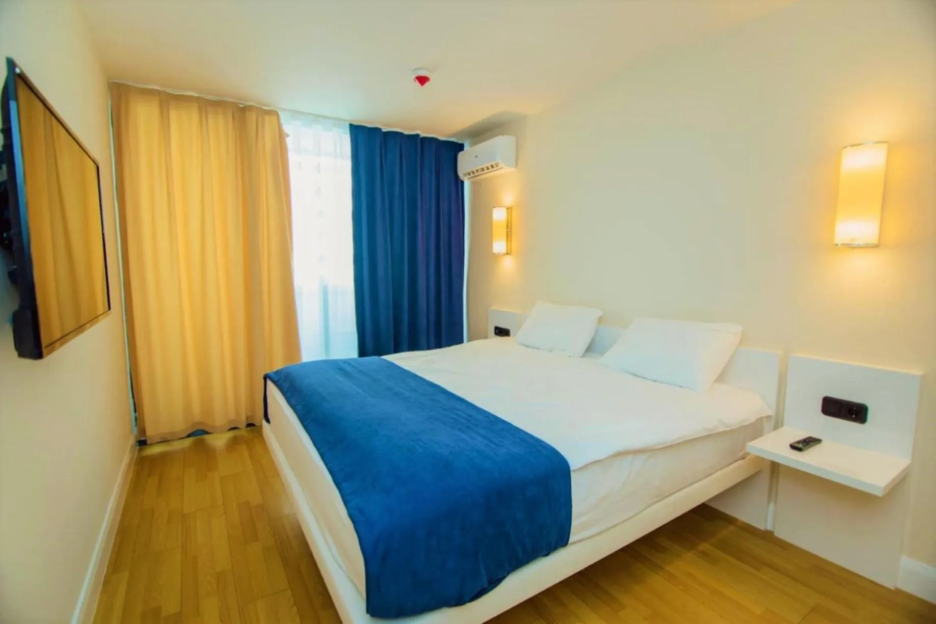 Bed in Elegance Sea View Aparthotel In Orbi City Batumi