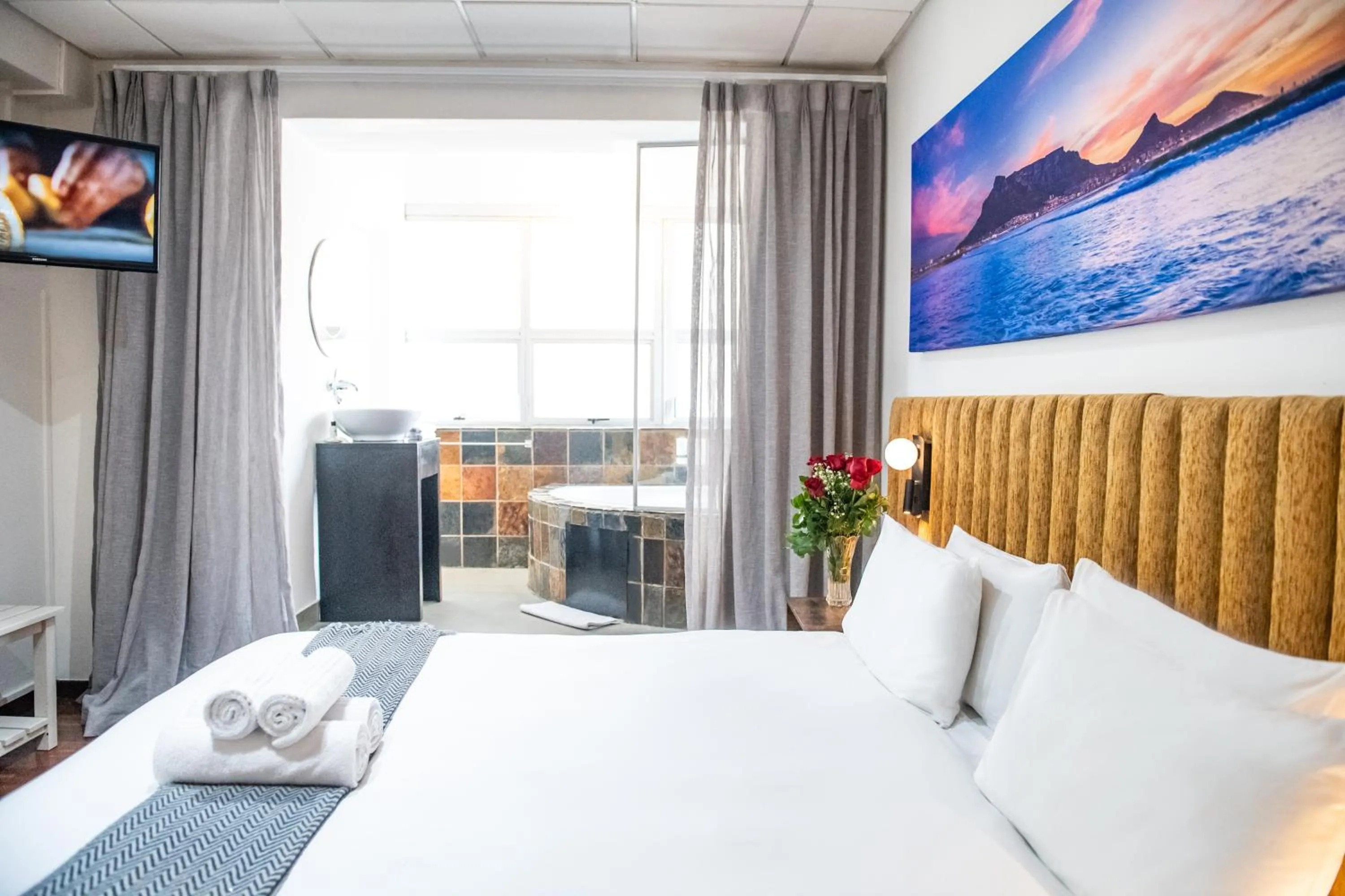 Bed in Cape Diamond Boutique Hotel