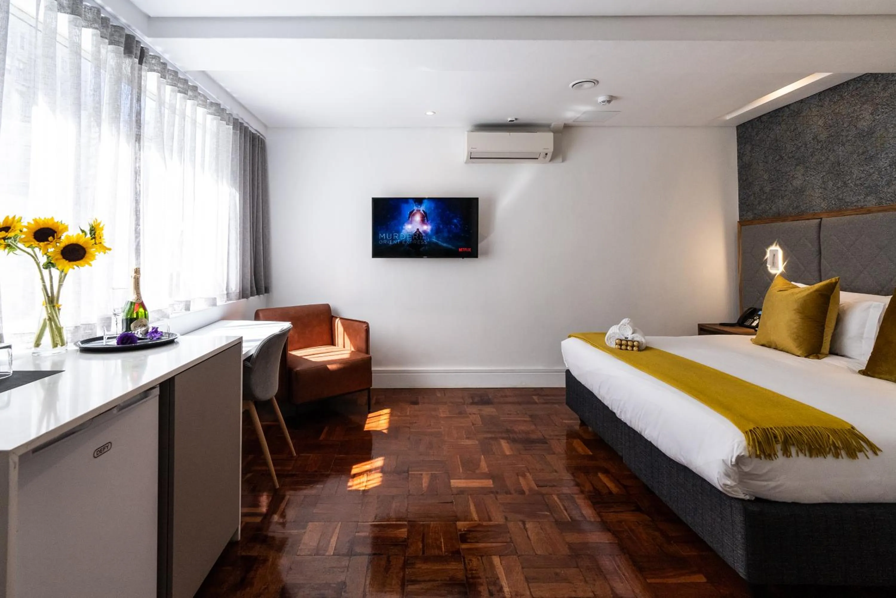 Bed in Cape Diamond Boutique Hotel