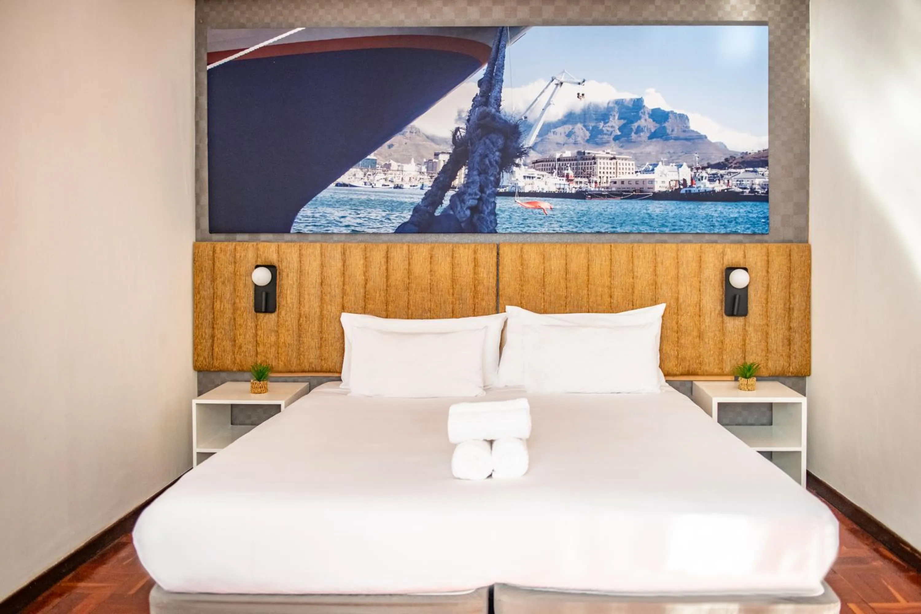 Bed in Cape Diamond Boutique Hotel