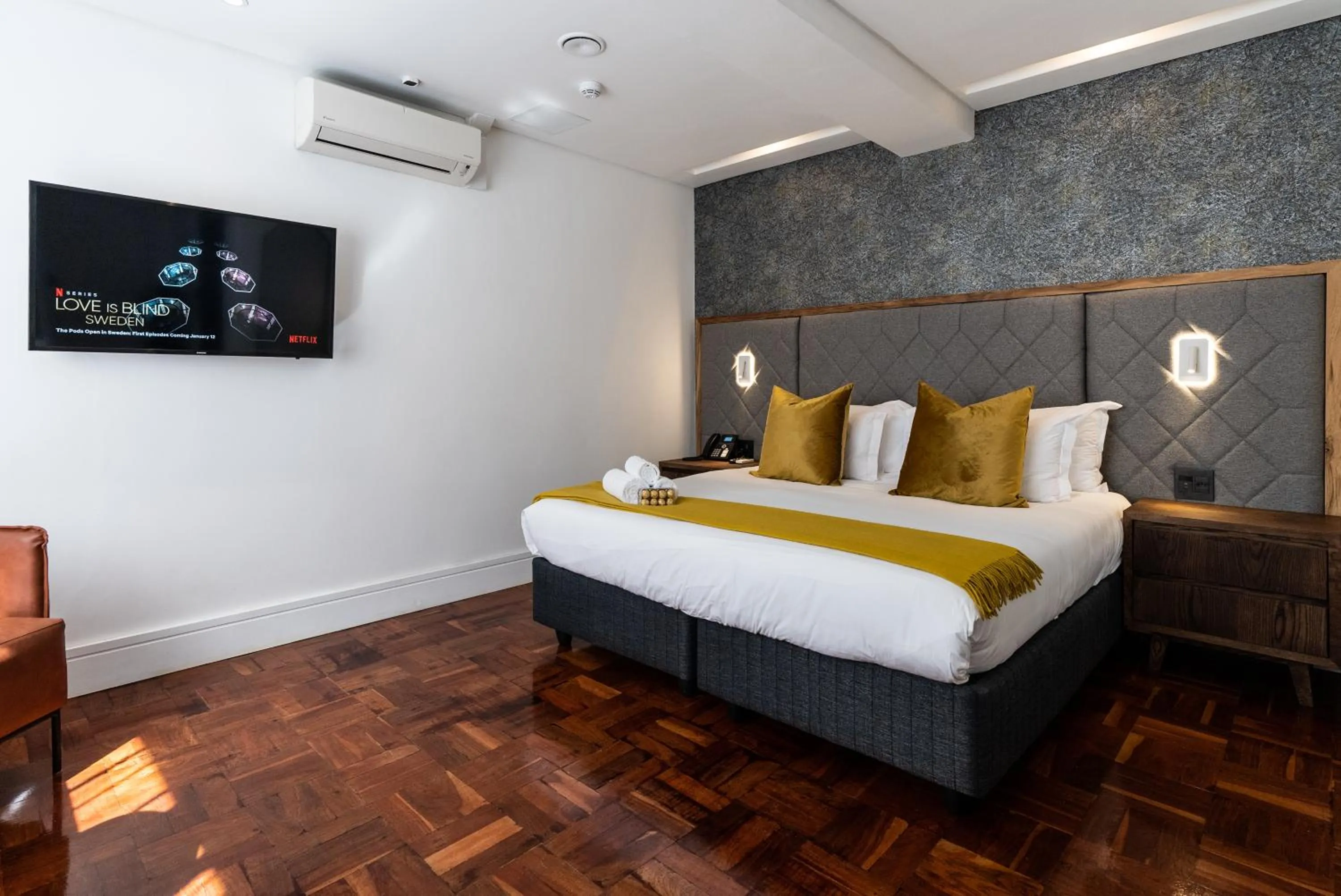 Bed in Cape Diamond Boutique Hotel