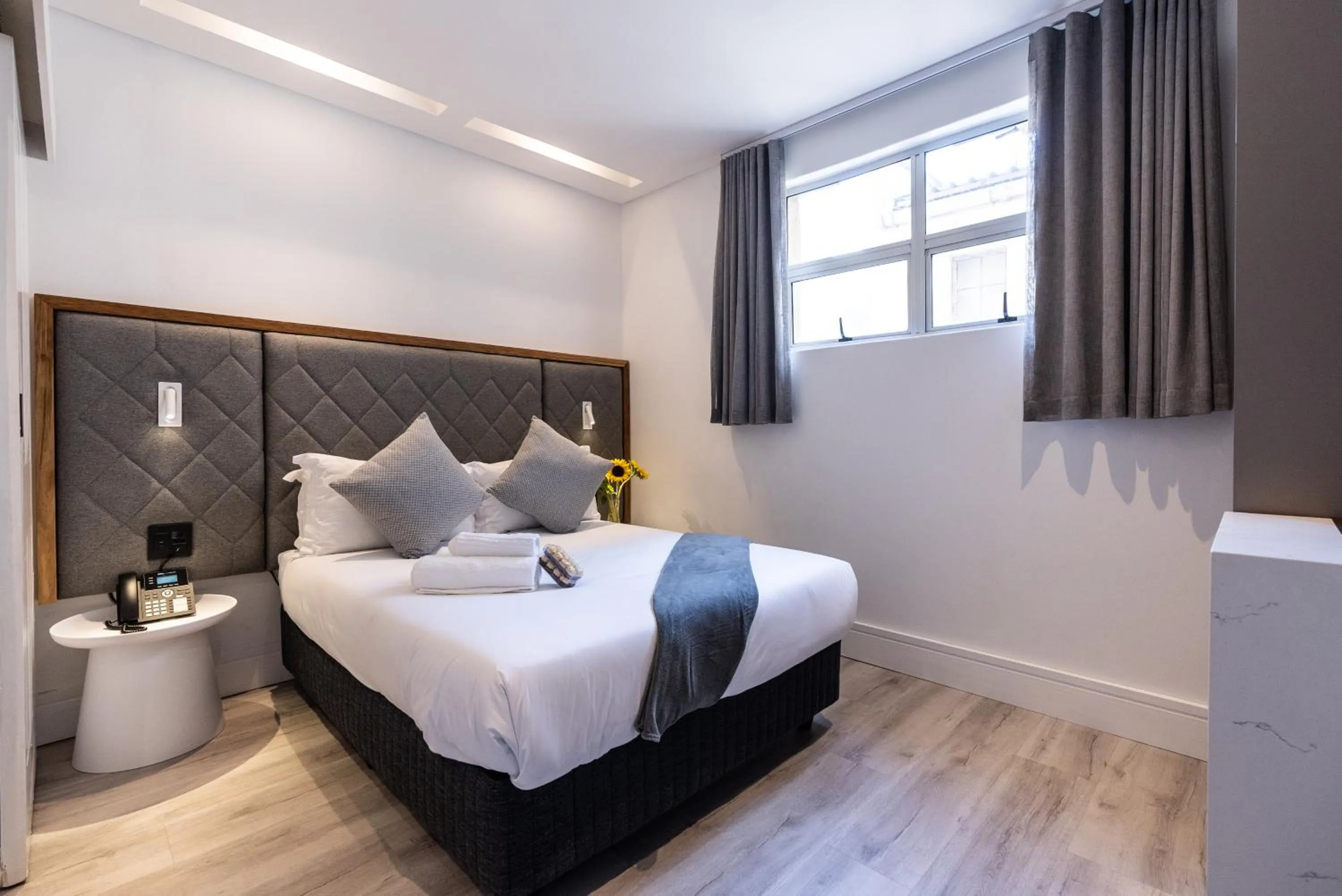 Photo of the whole room, Bed in Cape Diamond Boutique Hotel