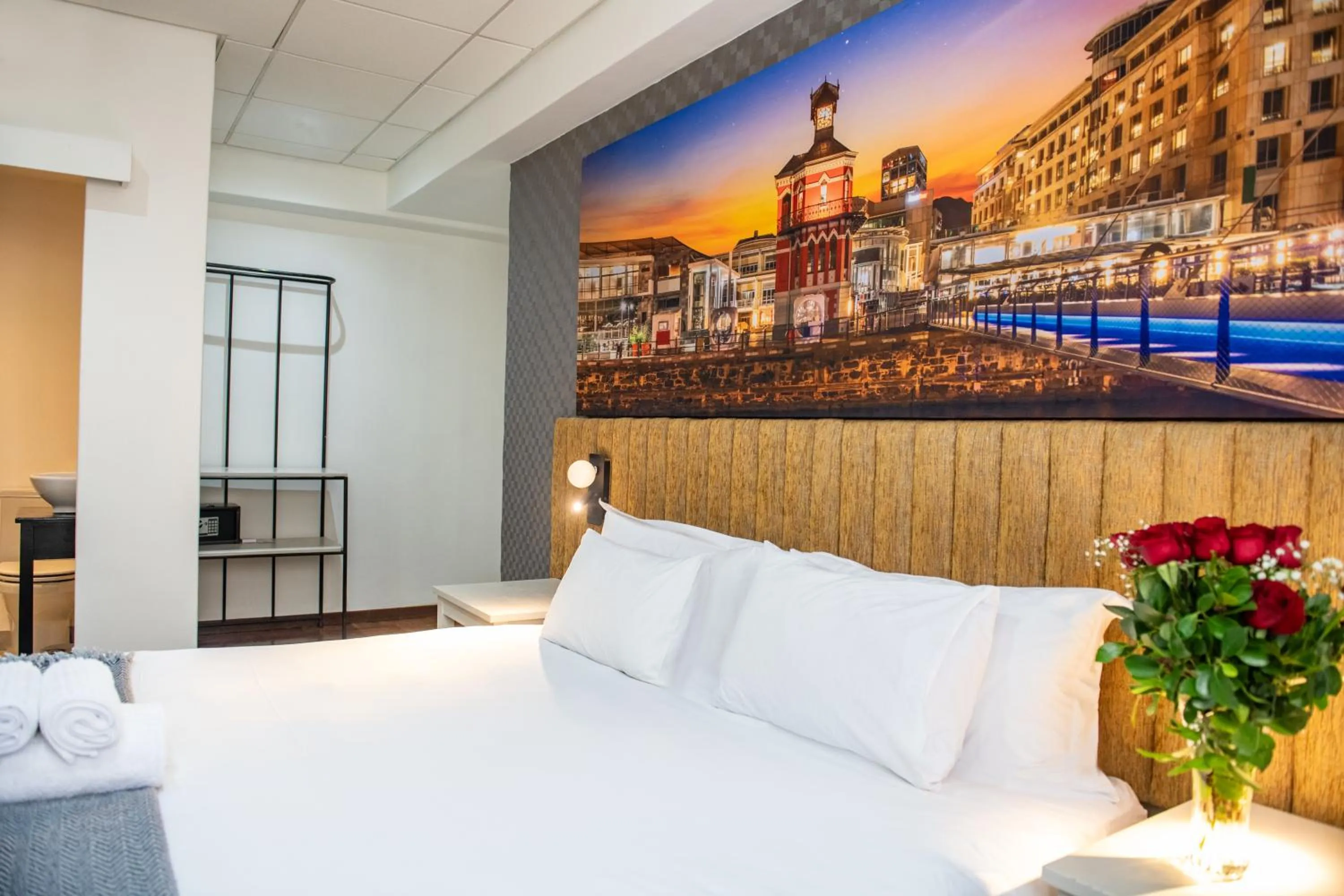 Bed in Cape Diamond Boutique Hotel