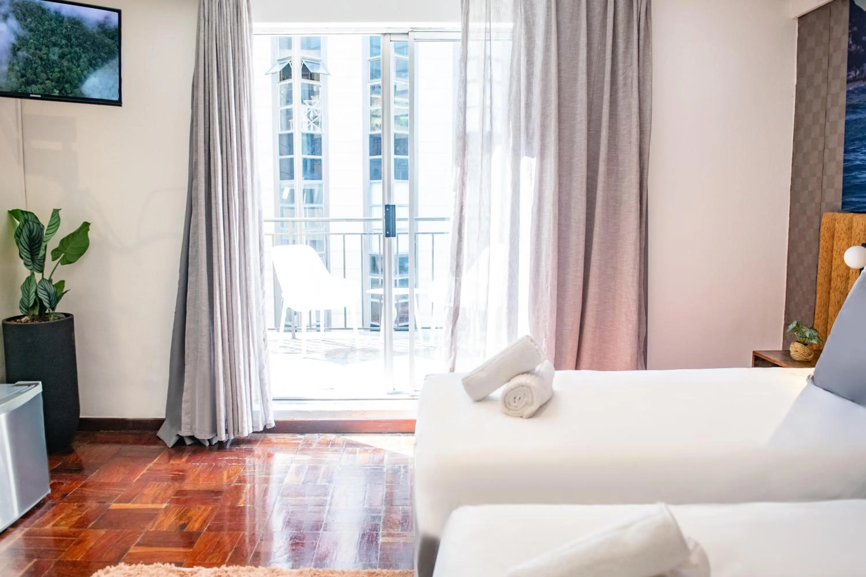 Bed in Cape Diamond Boutique Hotel