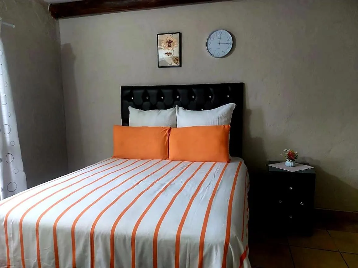 Bed in Daven Guest House