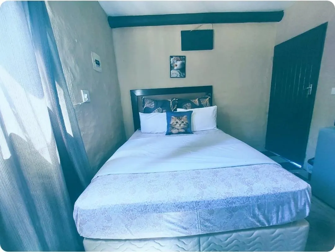Bed in Daven Guest House