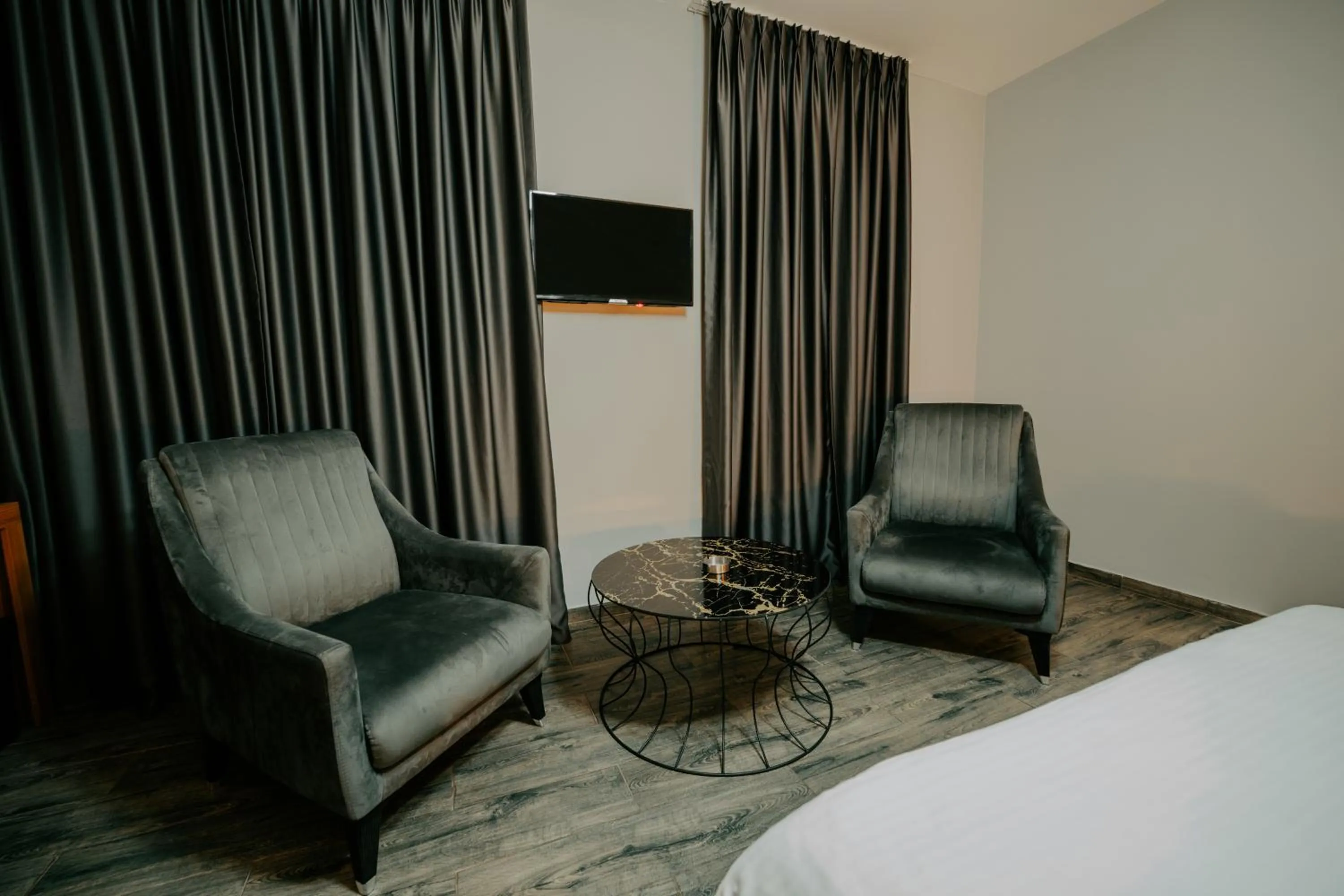 Bed in Grand Quars Hotel