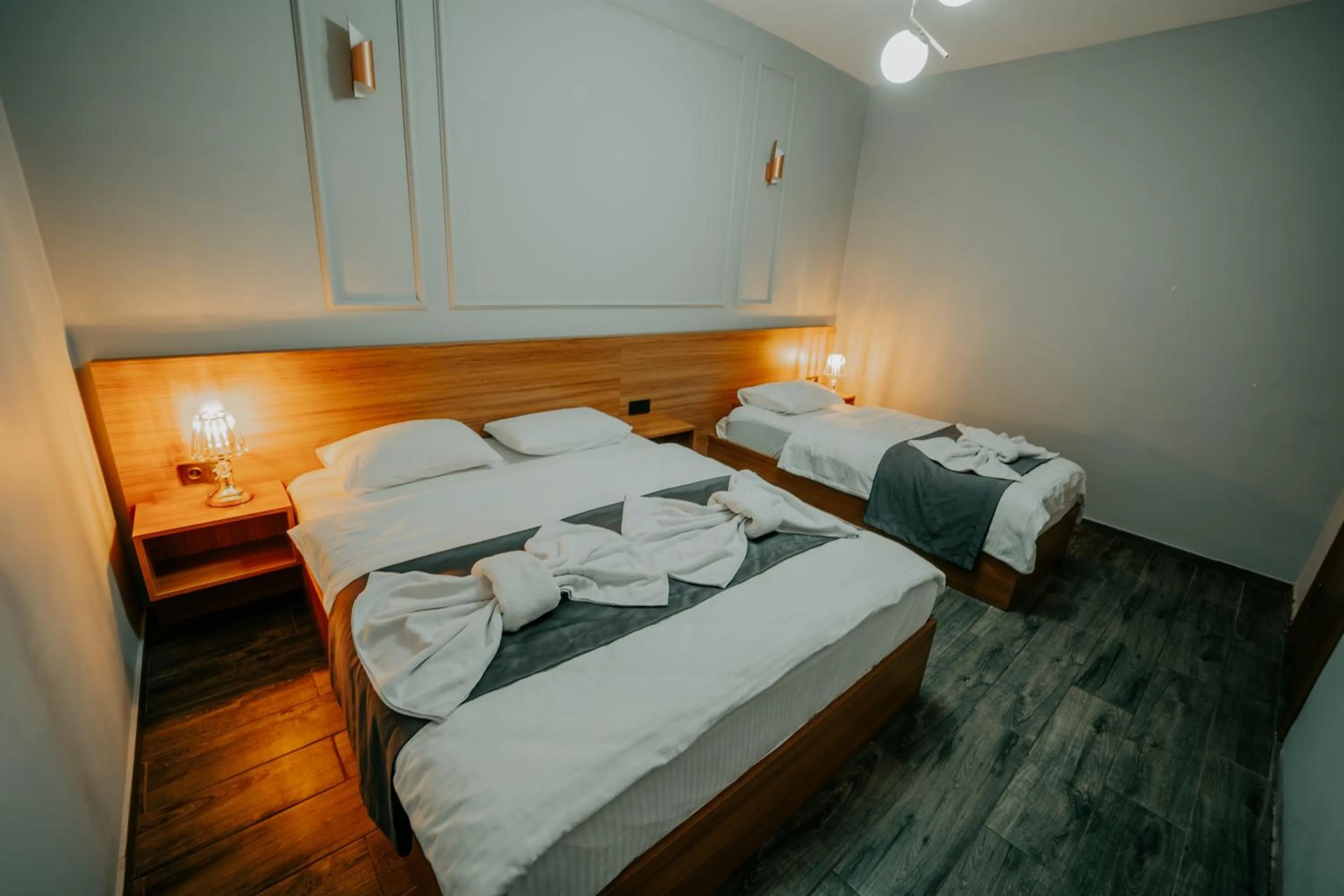 Bed in Grand Quars Hotel