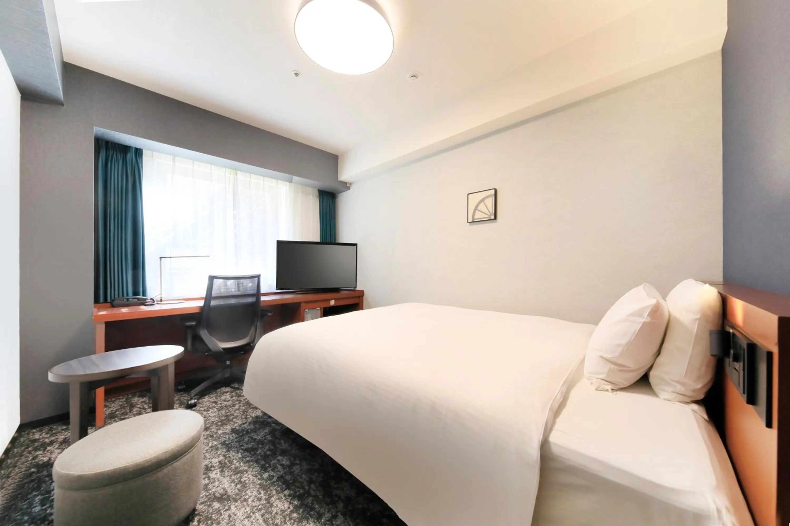 Bed in Richmond Hotel Yokohama-Bashamichi