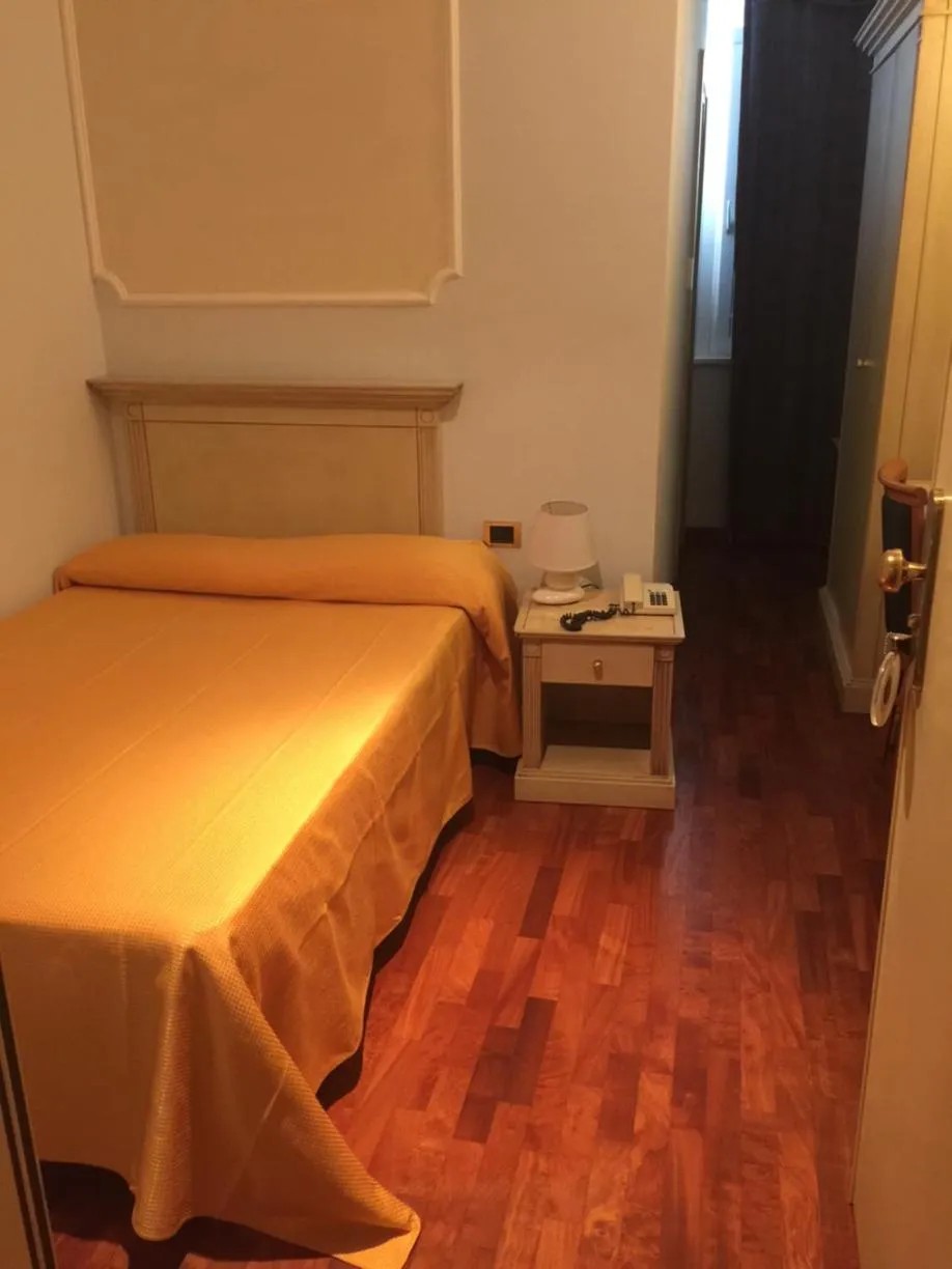 Bed in Hotel Villa Medici