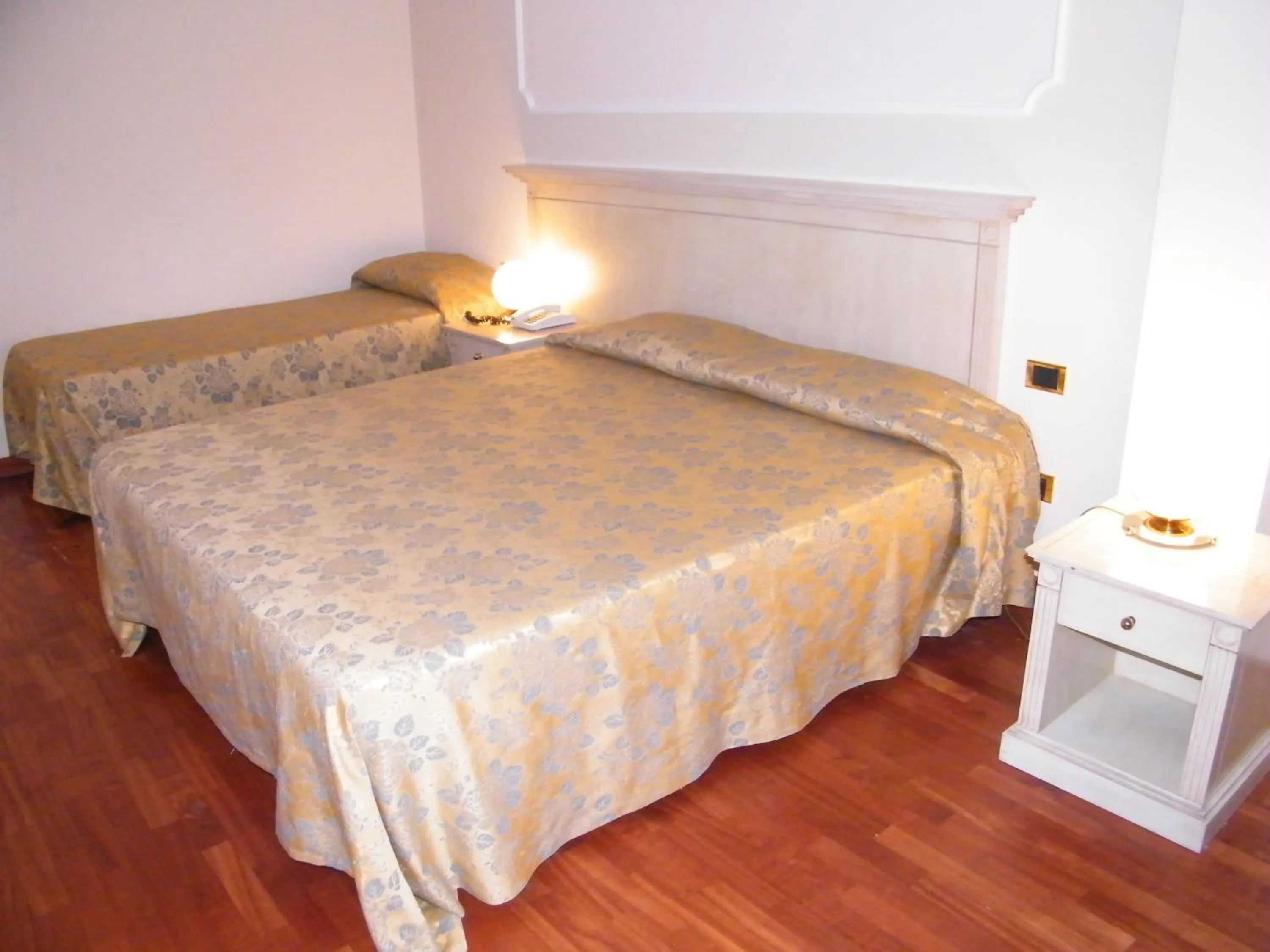 Bed in Hotel Villa Medici