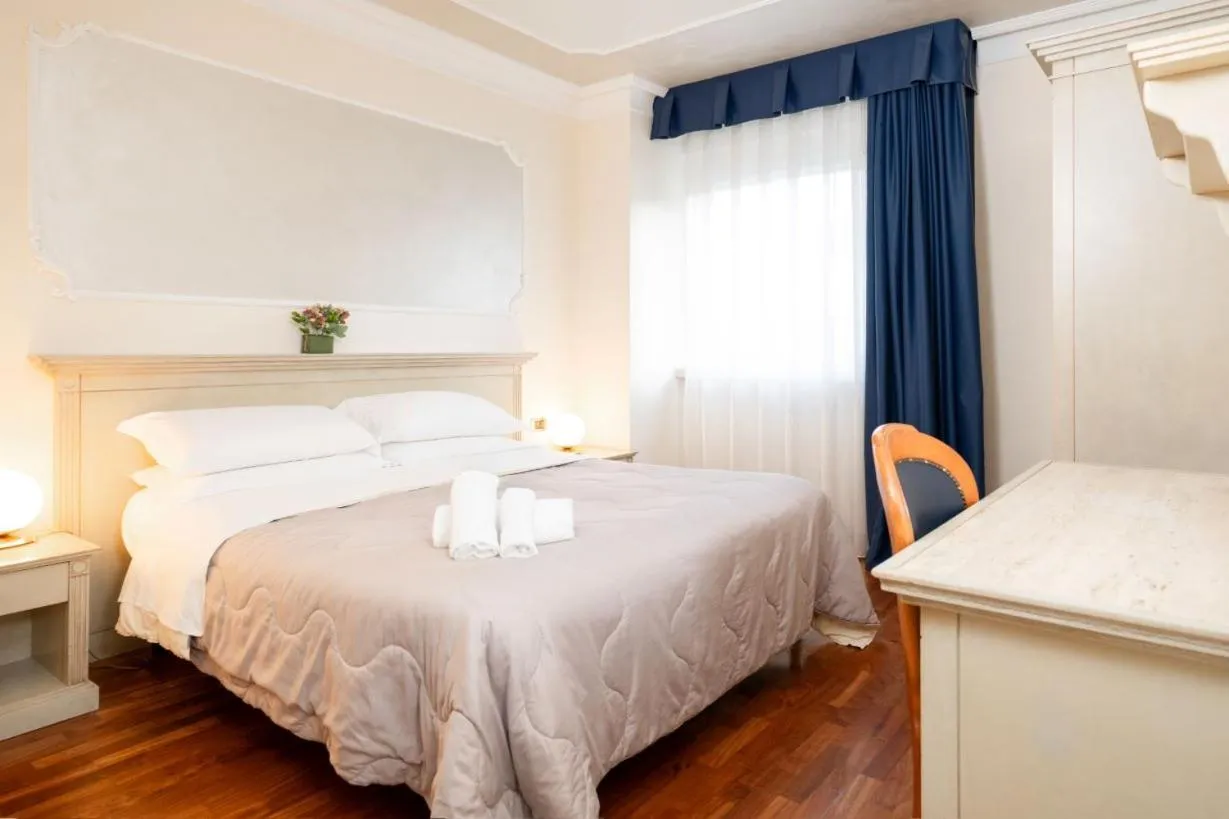 Bed in Hotel Villa Medici