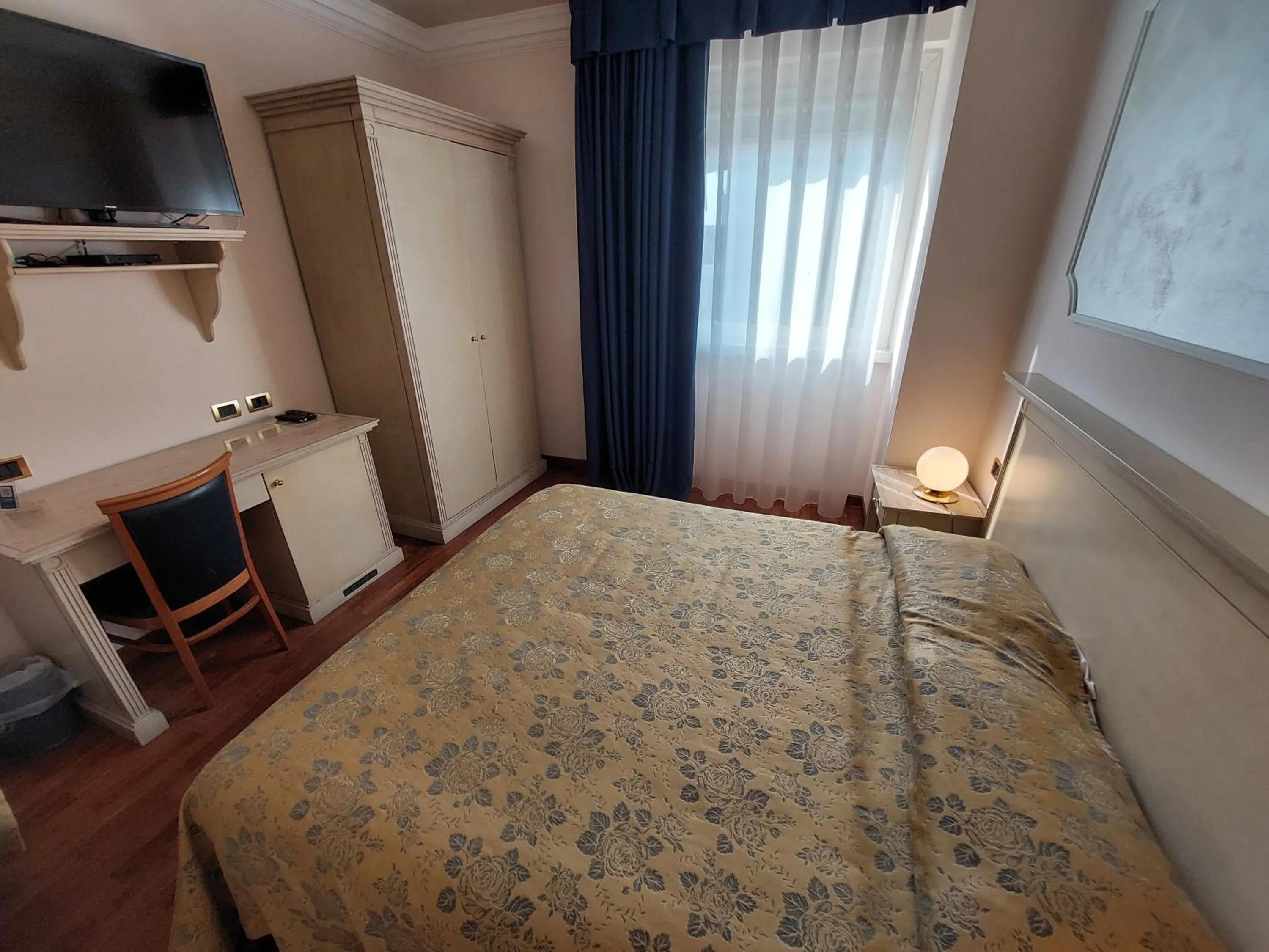 Bed in Hotel Villa Medici