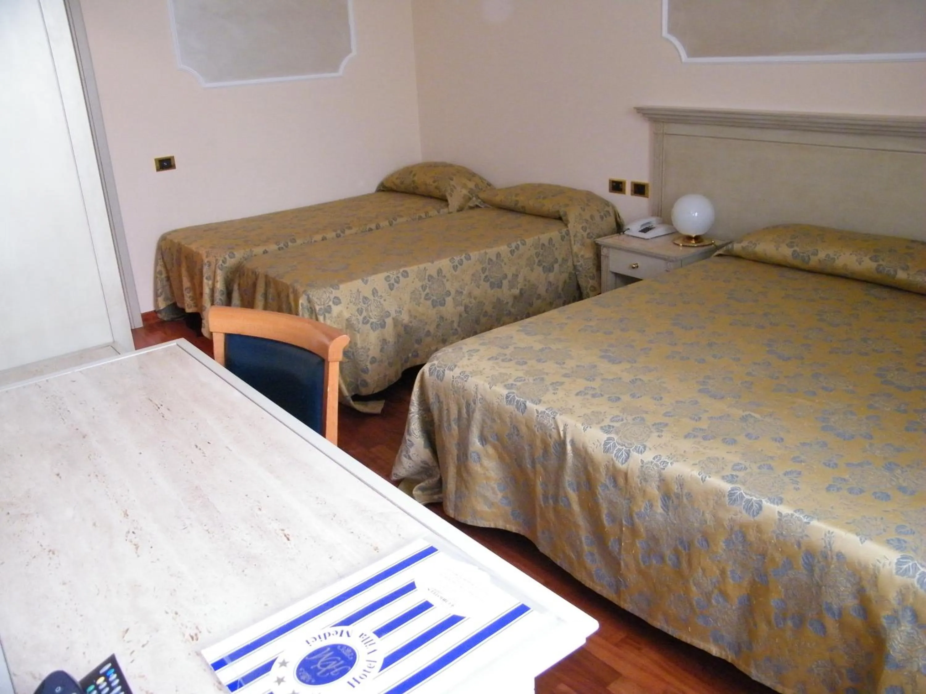 Bed in Hotel Villa Medici