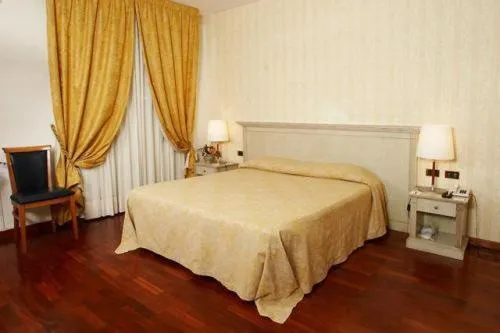 Bed in Hotel Villa Medici