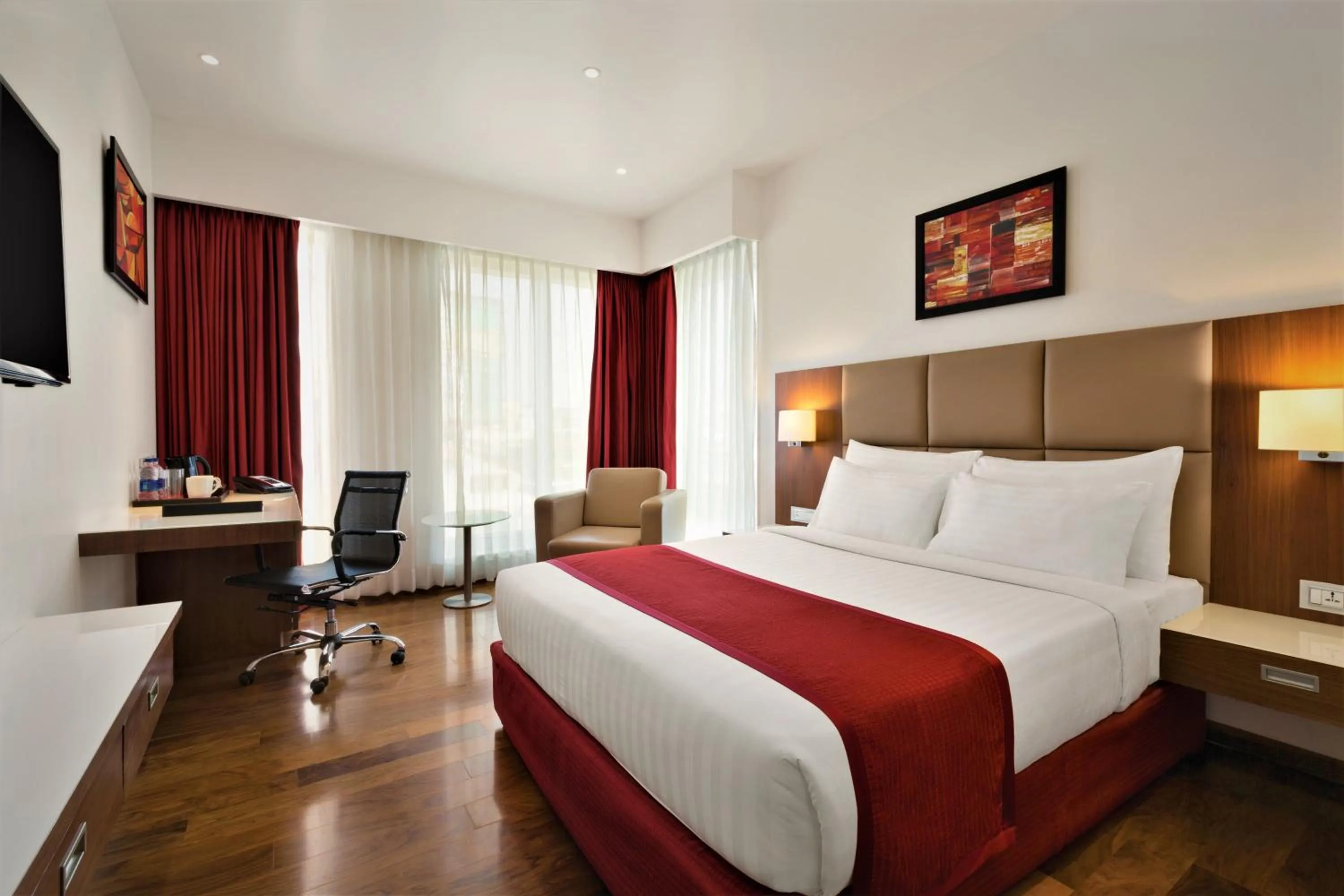 Photo of the whole room, Bed in Ramada Encore Domlur Bangalore