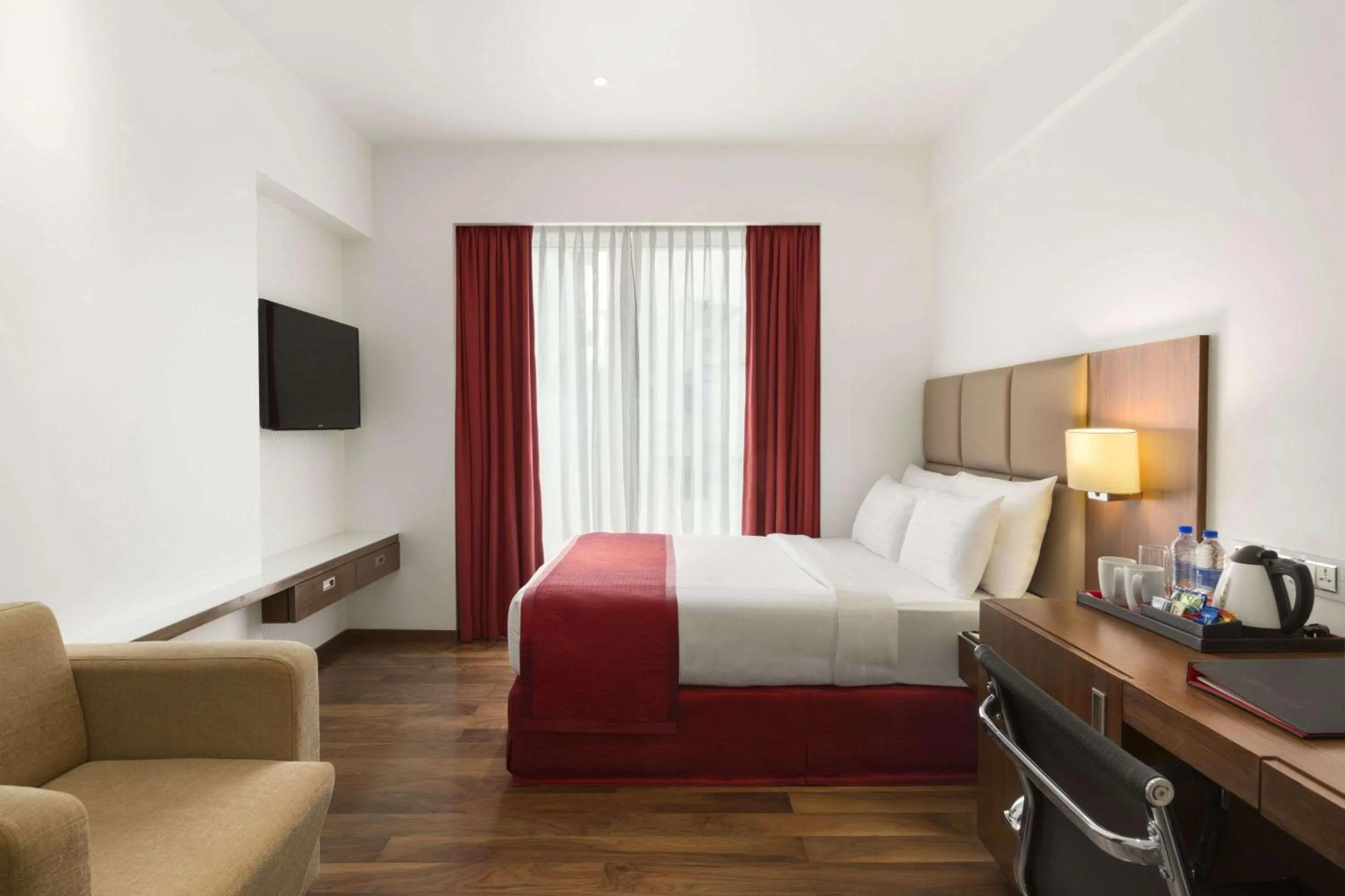 Photo of the whole room, Bed in Ramada Encore Domlur Bangalore