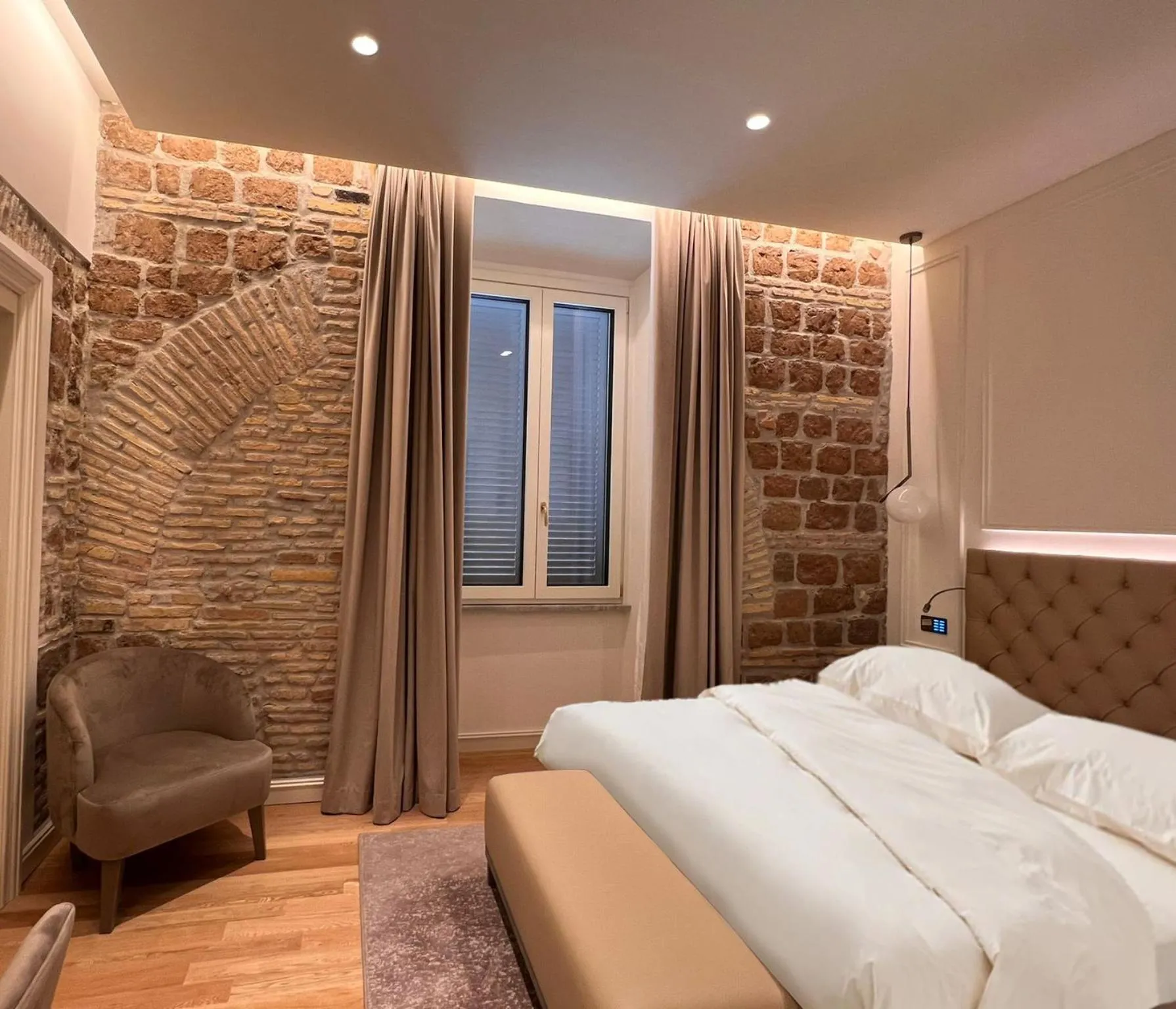 Bed in Martina Suites