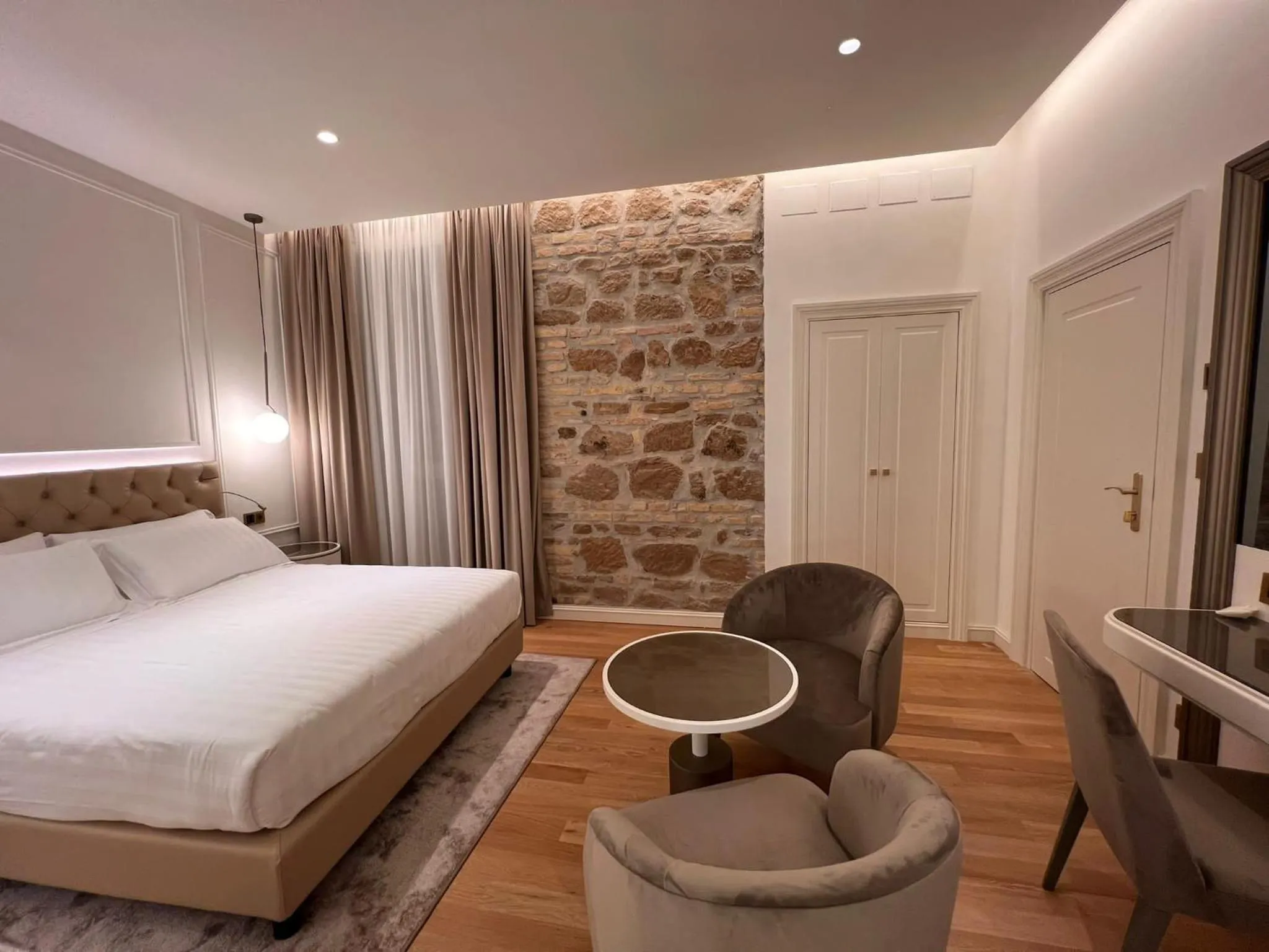 Bed in Martina Suites