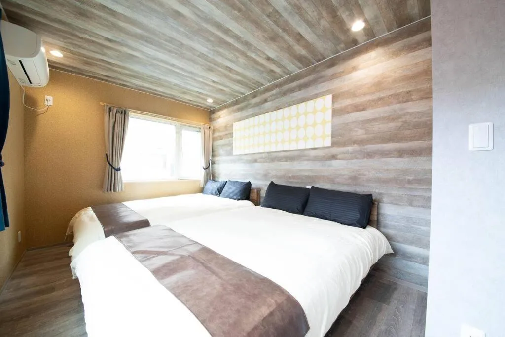 Bed in The BEEHIVE OTARU