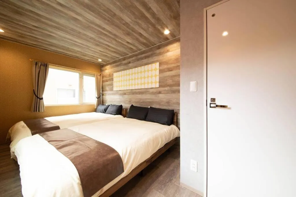 Bed in The BEEHIVE OTARU