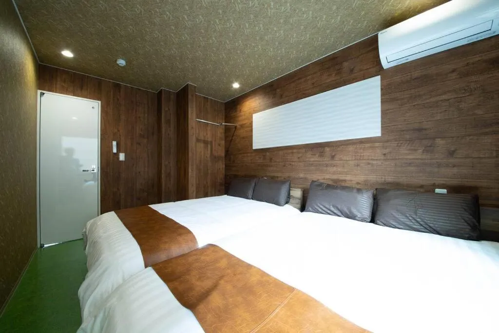 Bed in The BEEHIVE OTARU