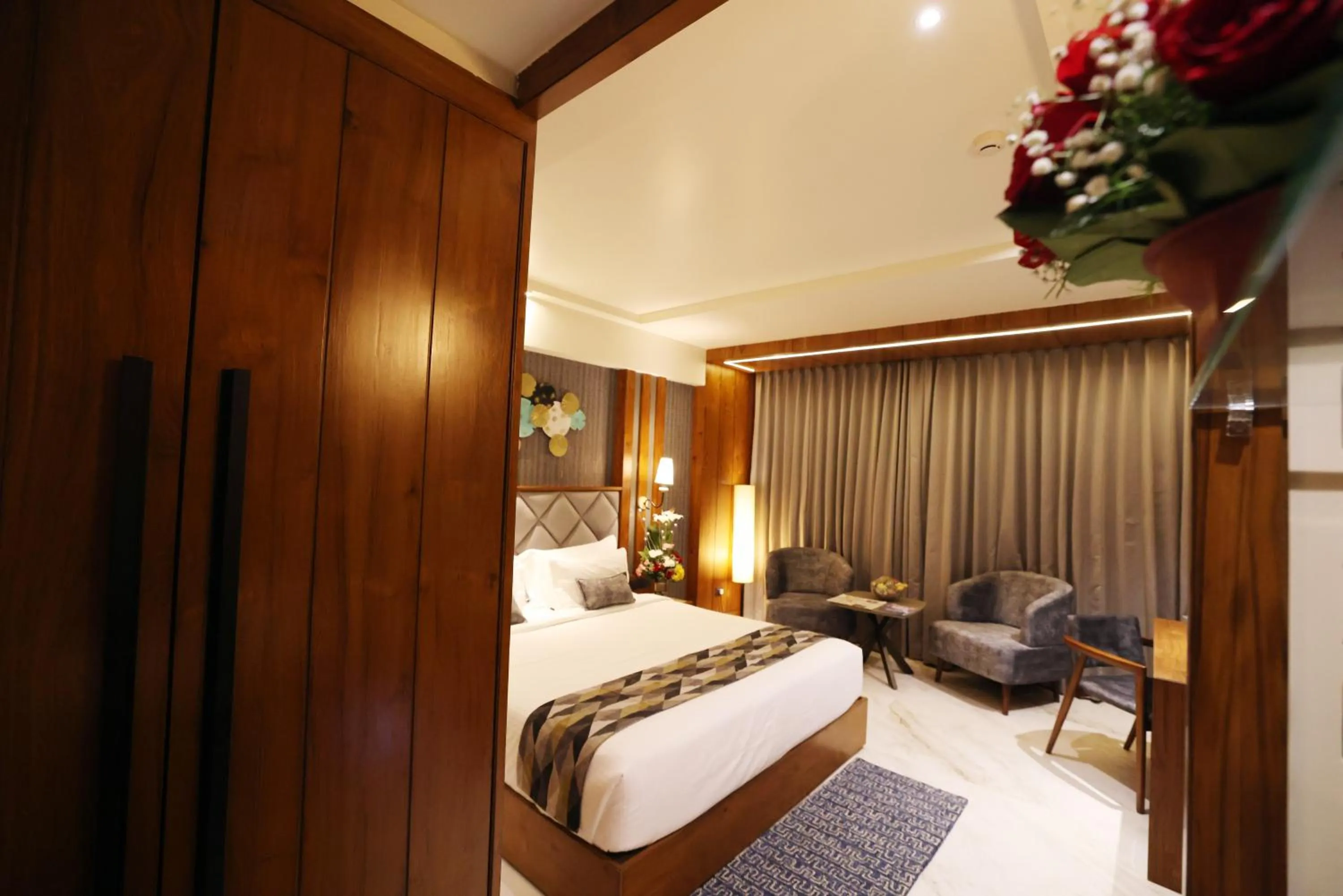 Bed in AJ Grand Hotel