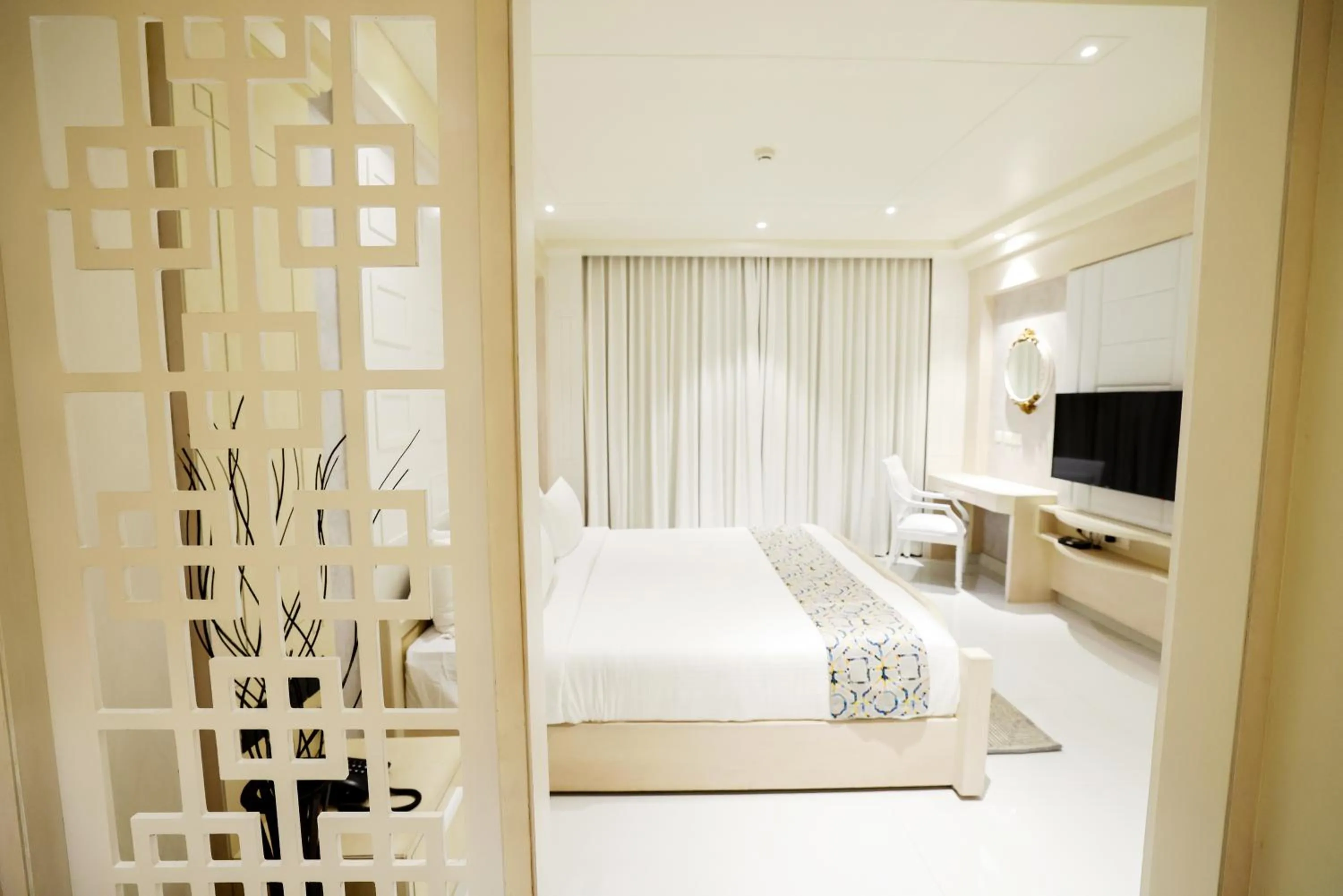 Bed in AJ Grand Hotel