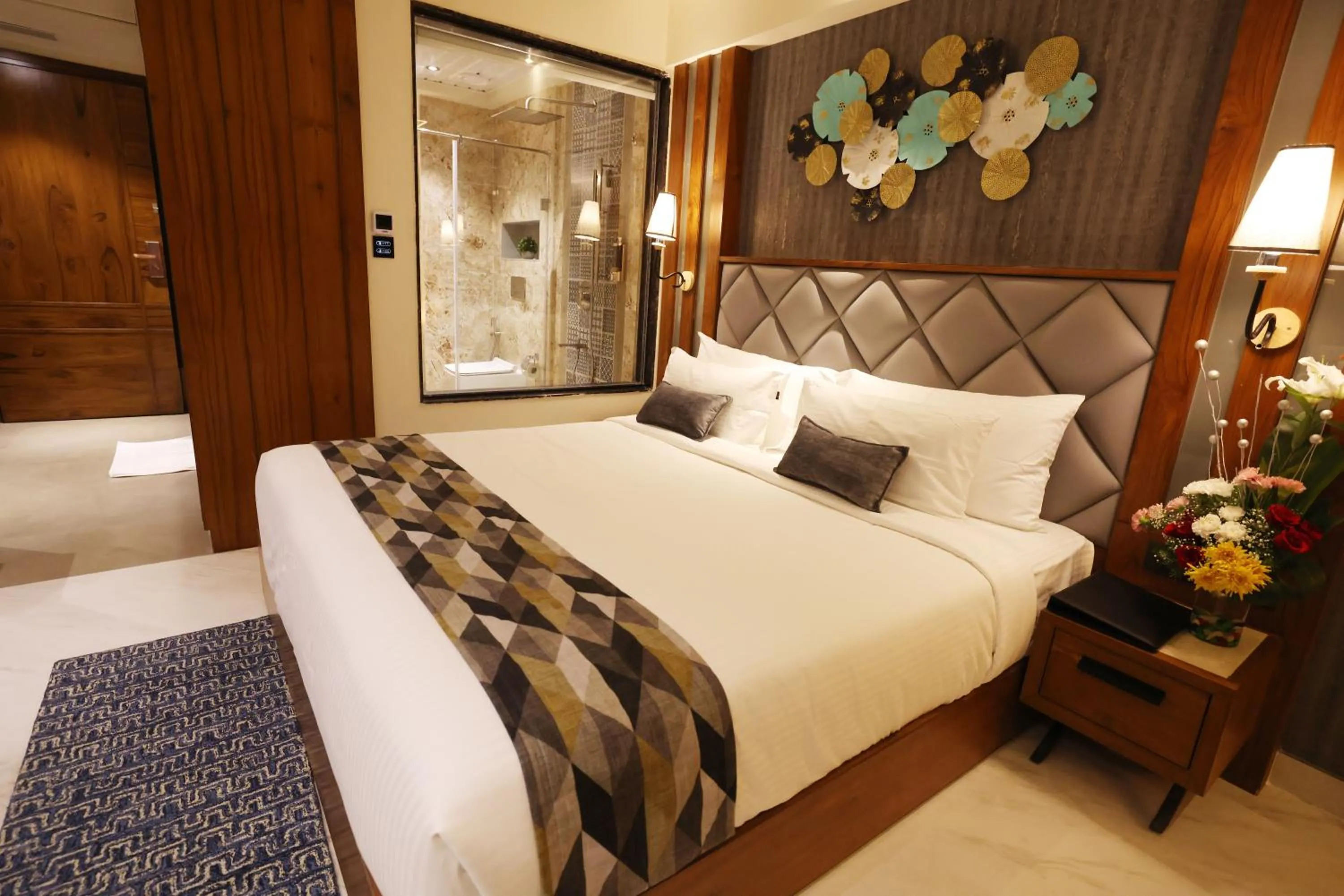 Bed in AJ Grand Hotel