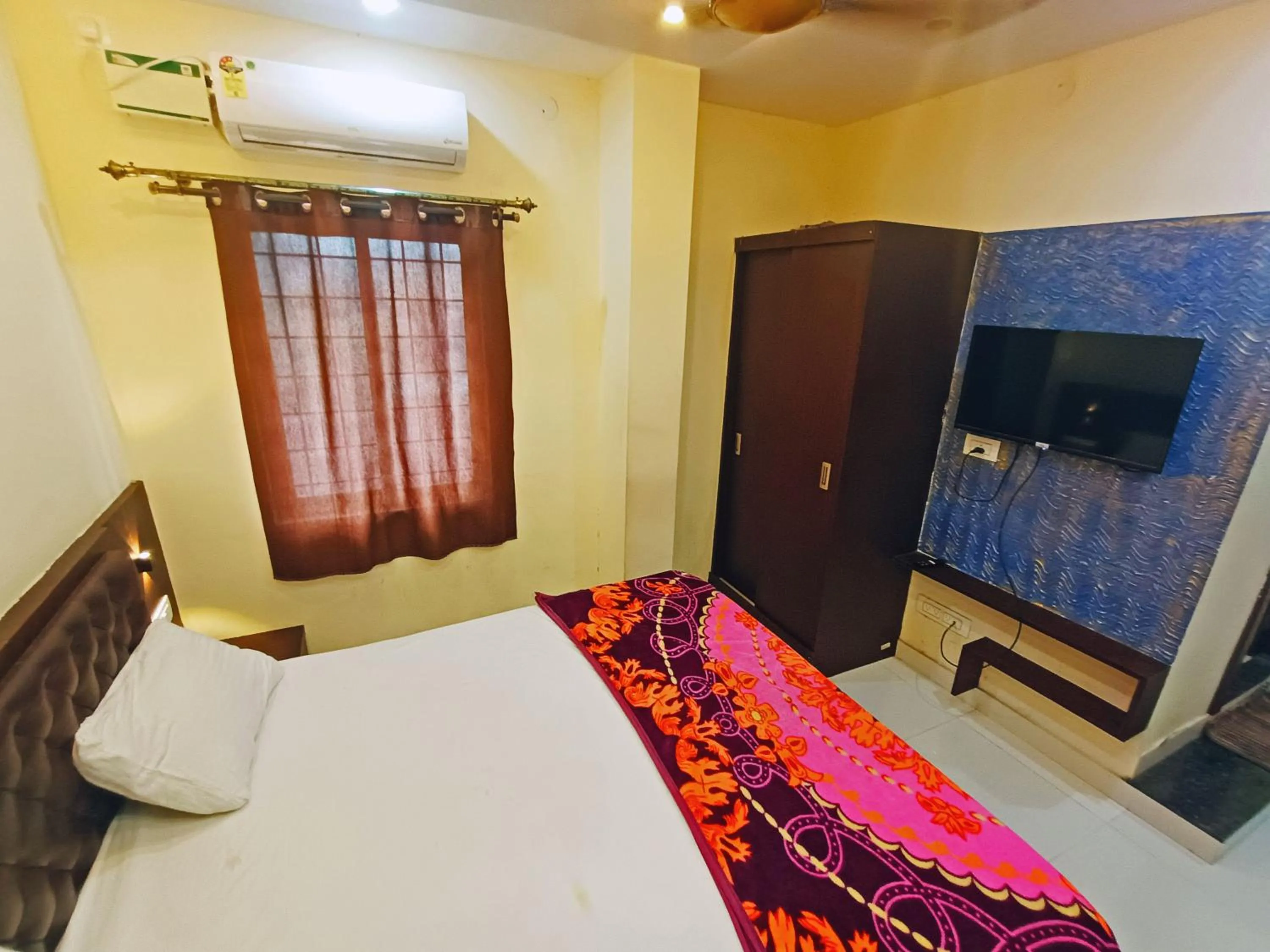 Bedroom, Bed in MG Residency