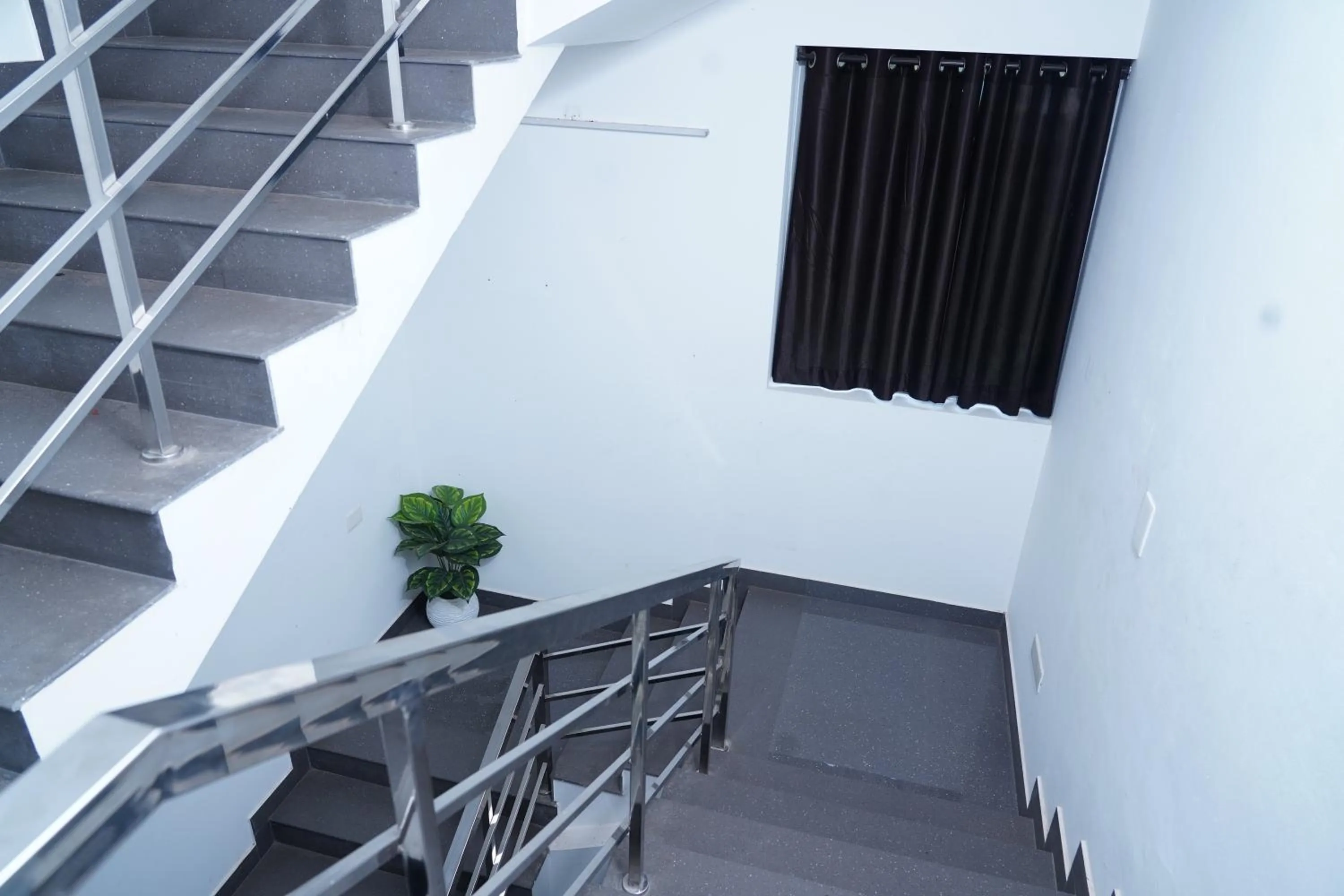 Property building in Atmos Inn Calicut Near Aster Mims Hospital