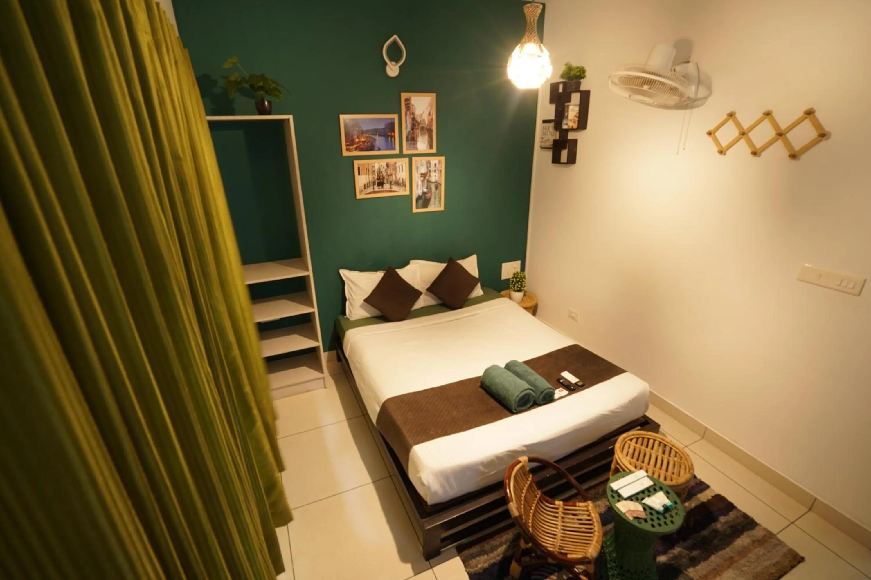 Bed in Atmos Inn Calicut Near Aster Mims Hospital