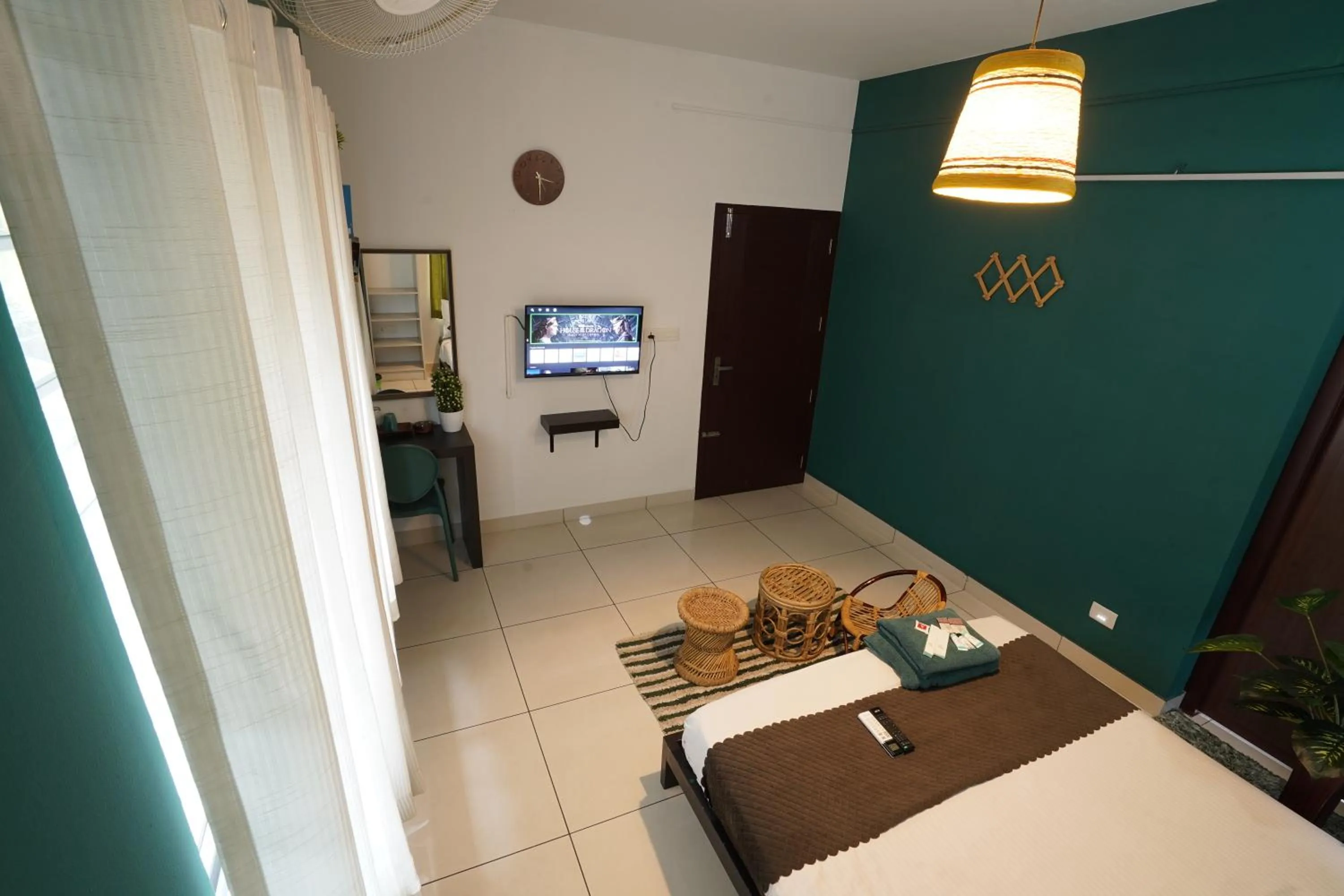 Bed in Atmos Inn Calicut Near Aster Mims Hospital