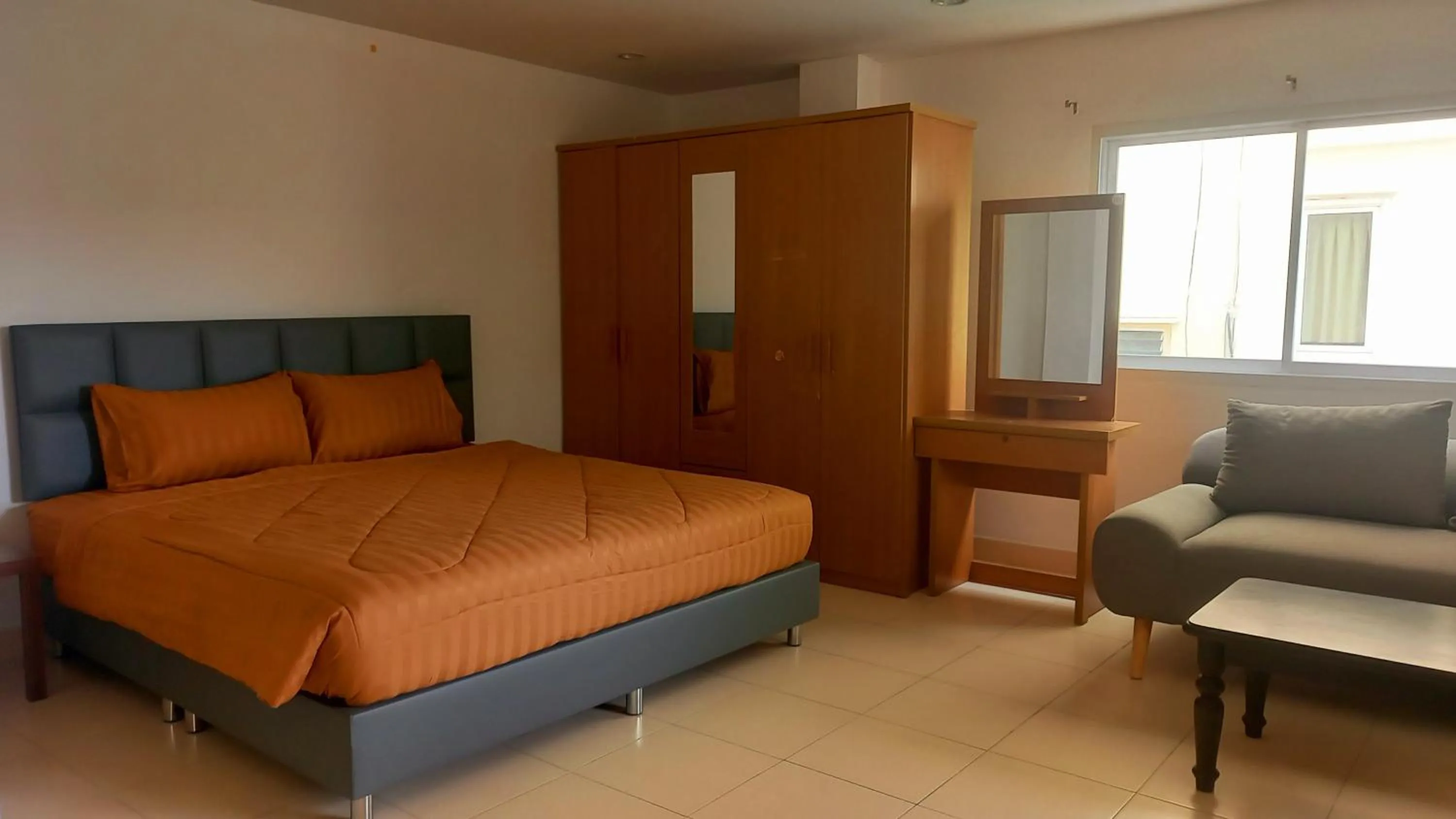 Bed in K2 Seaside Suites