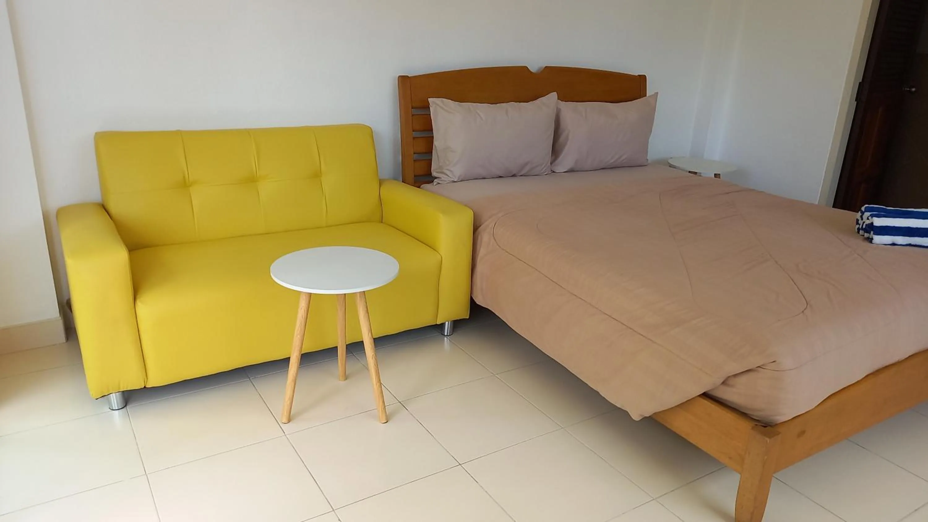 Bed in K2 Seaside Suites