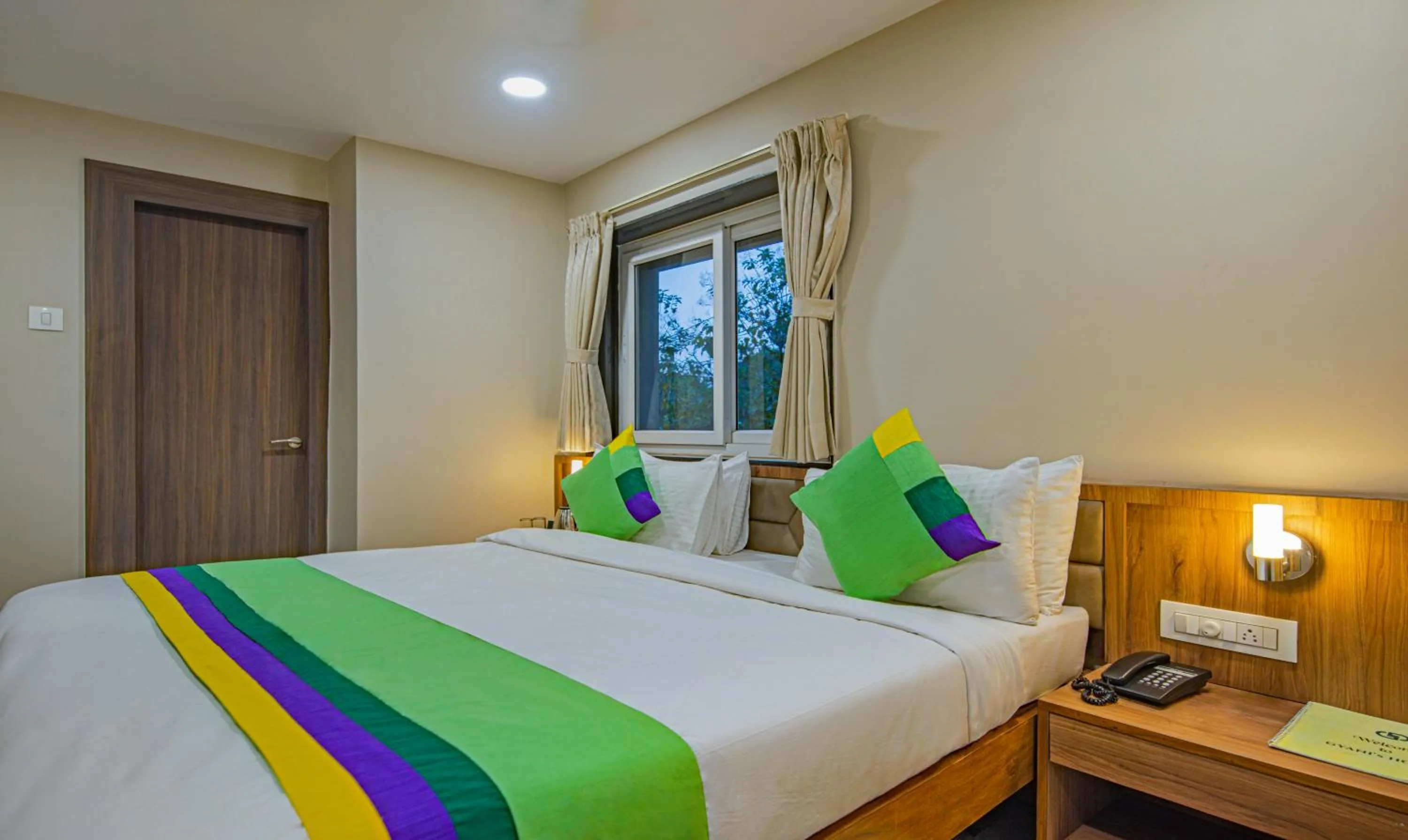 Bedroom, Bed in Treebo Gyani's