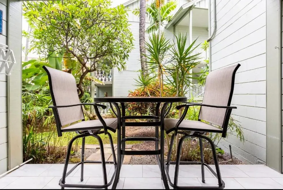 Patio in DOWNTOWN Hawaiian Theme Condo with Hot Tub, Pool & Beach - Kona Islander Inn
