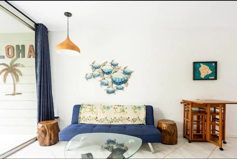 Living room in DOWNTOWN Hawaiian Theme Condo with Hot Tub, Pool & Beach - Kona Islander Inn