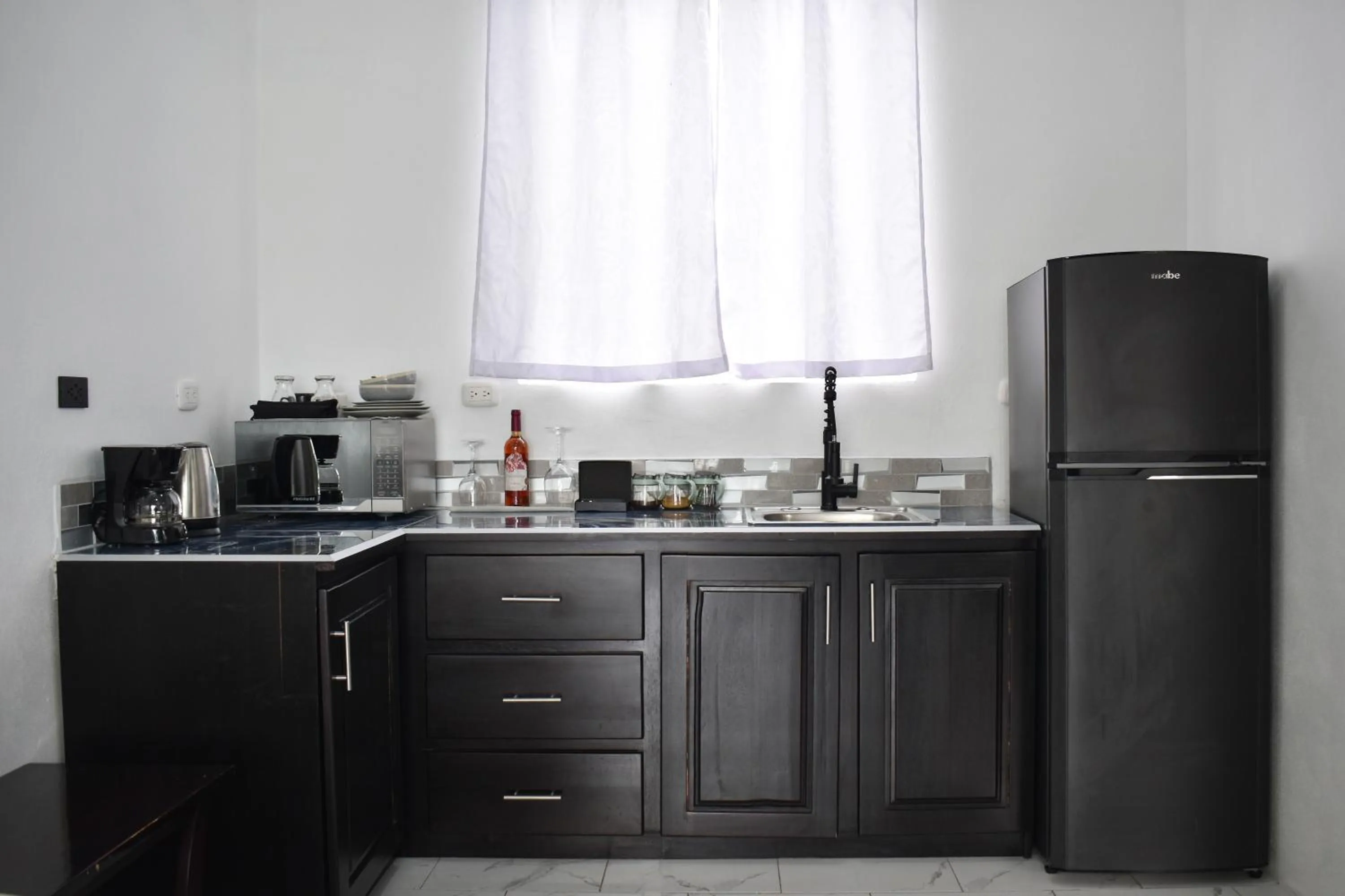 Kitchen or kitchenette in Hotel Serendipity